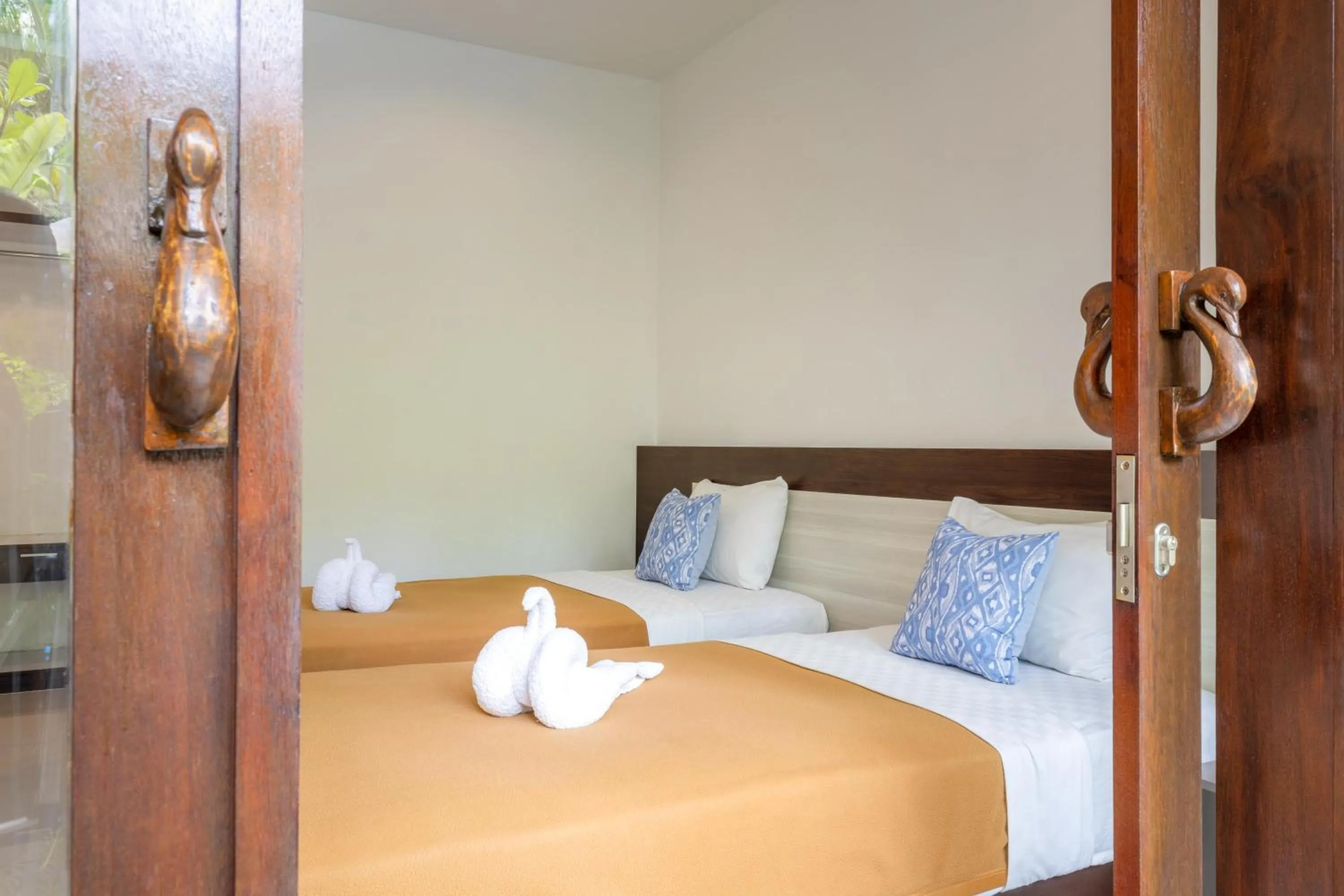 Bed in Dewi Villa Padangbai Hotel