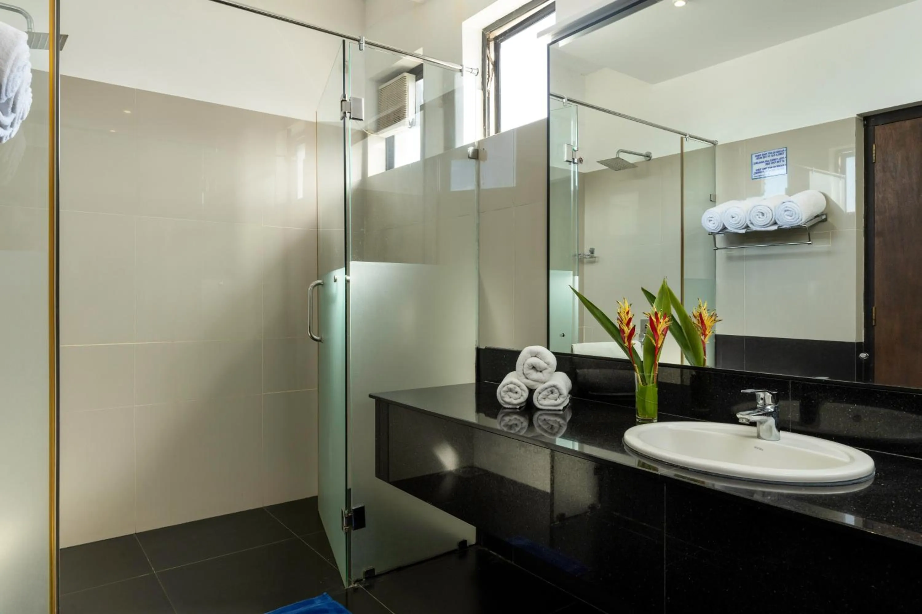 Shower in The Blue Wave Hotel