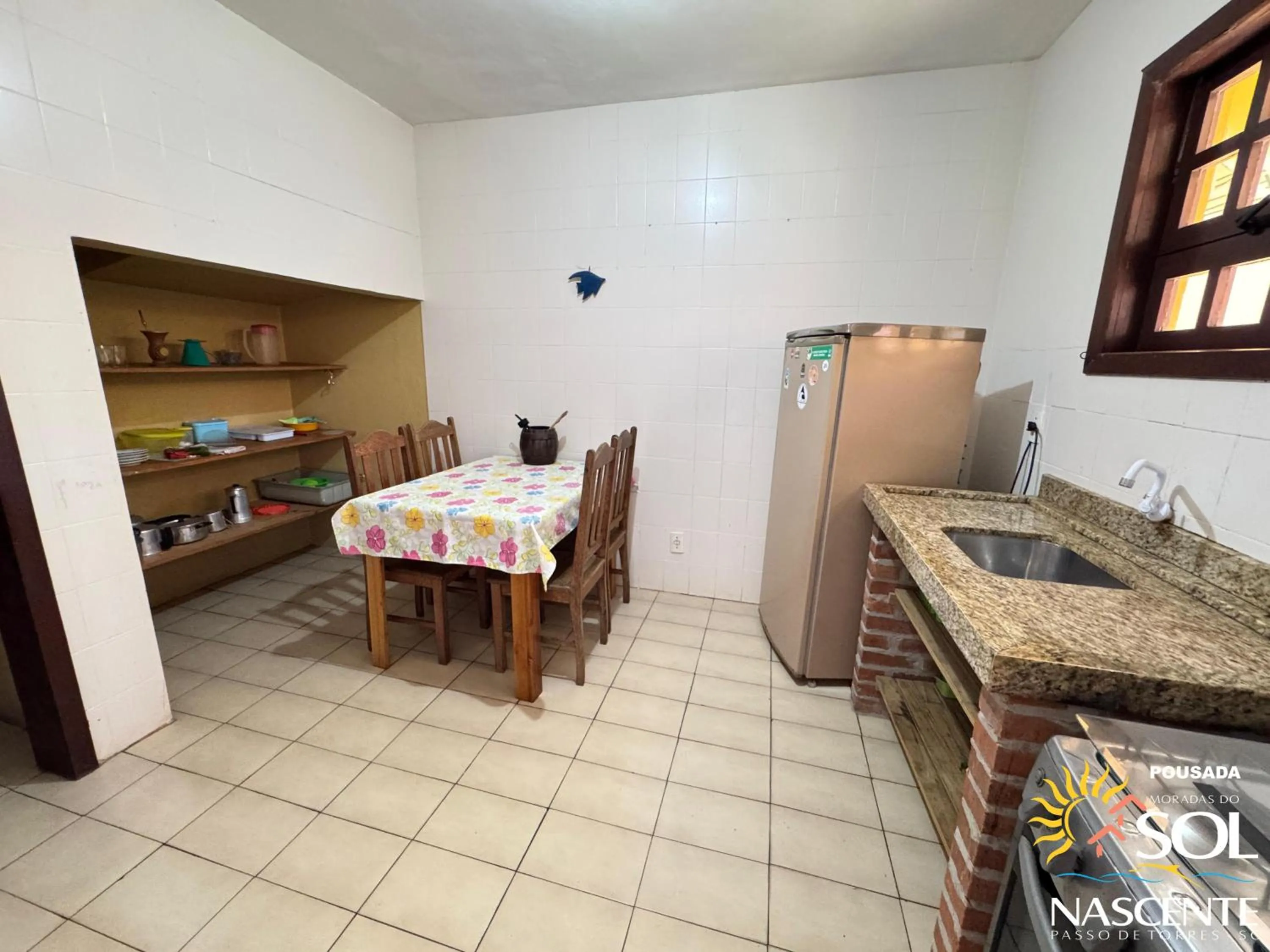 Kitchen or kitchenette in Pousada Moradas do Sol Nascente