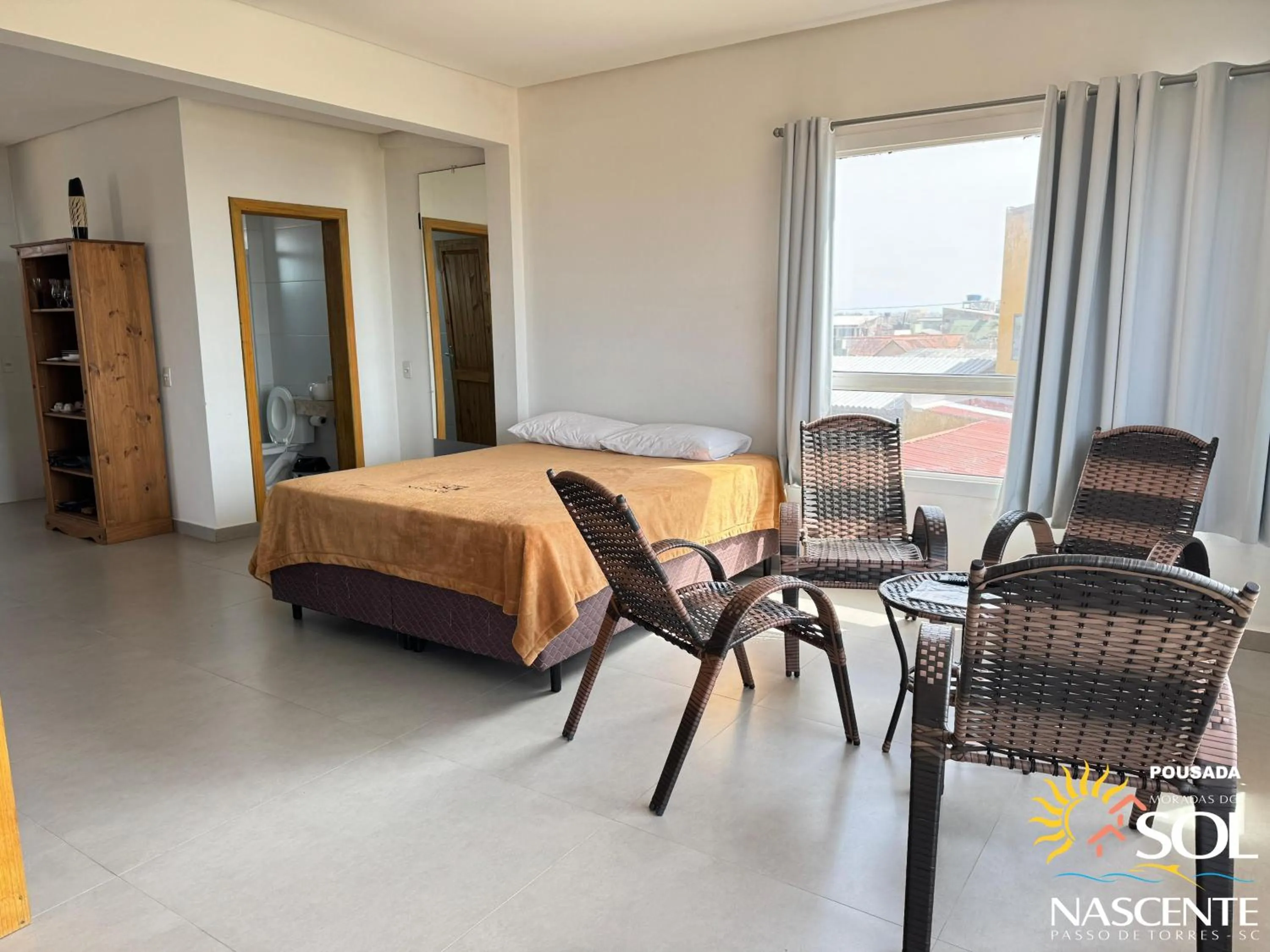 Photo of the whole room, Bed in Pousada Moradas do Sol Nascente