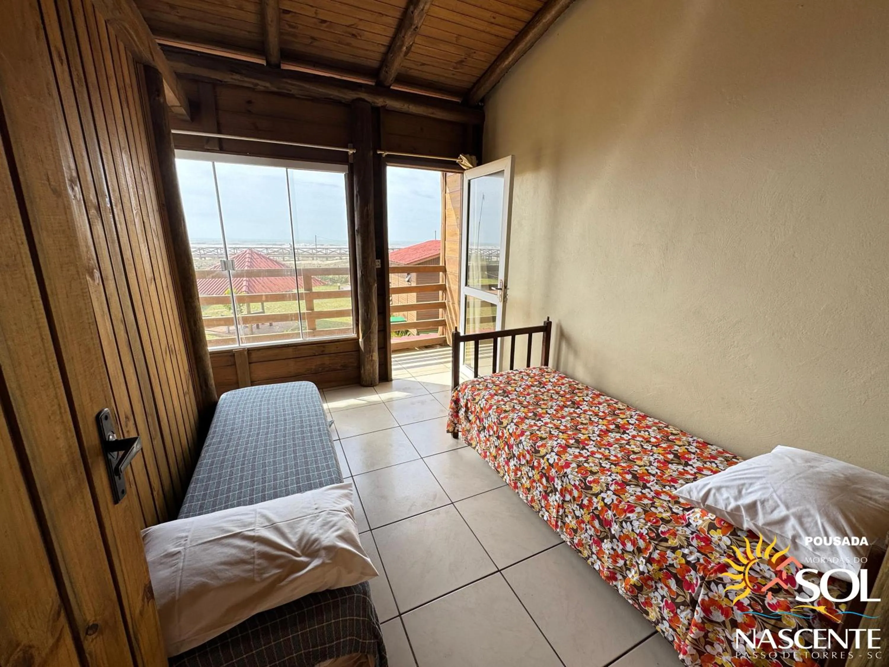 Photo of the whole room, Bed in Pousada Moradas do Sol Nascente