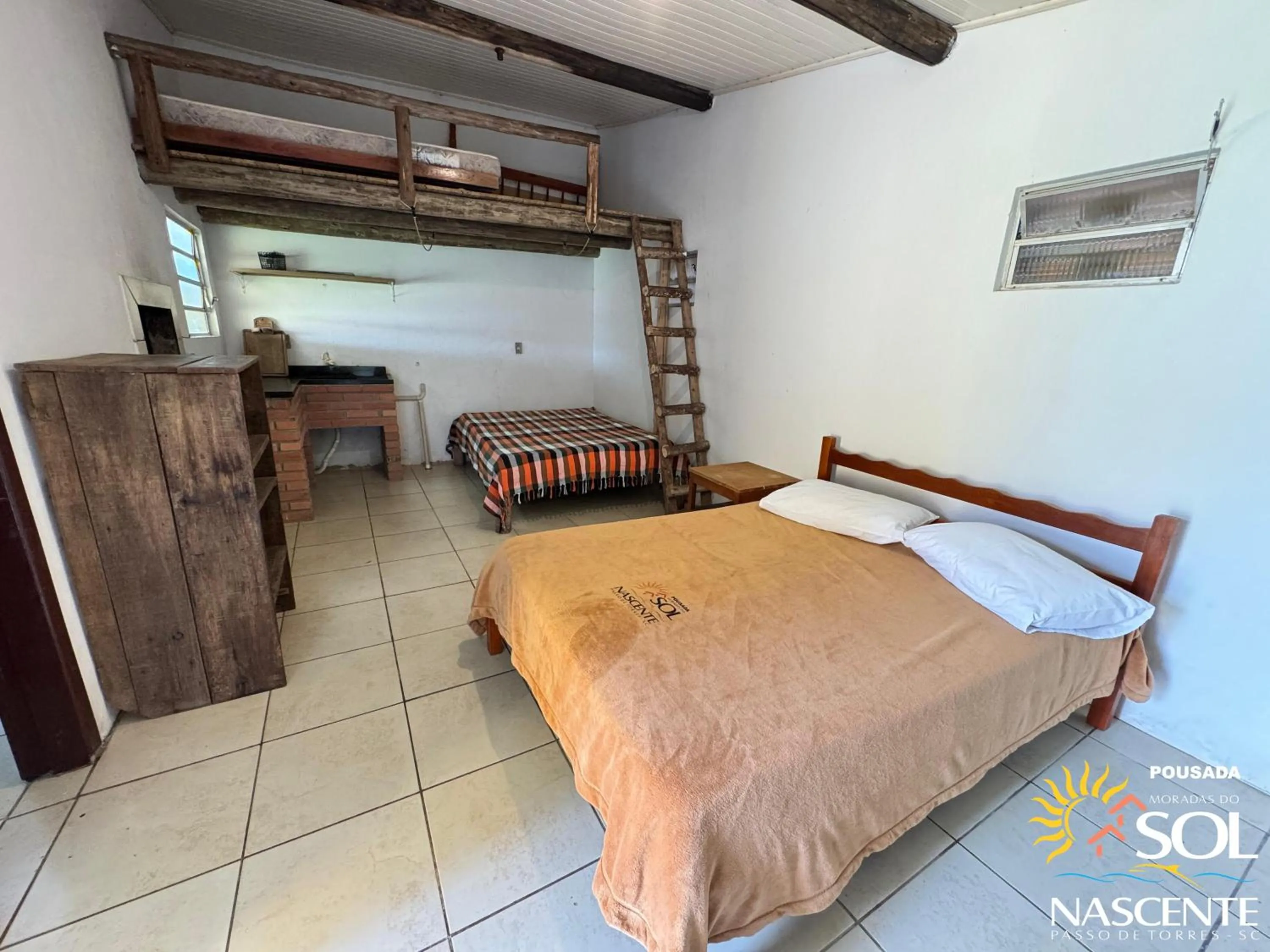 Photo of the whole room, Bed in Pousada Moradas do Sol Nascente