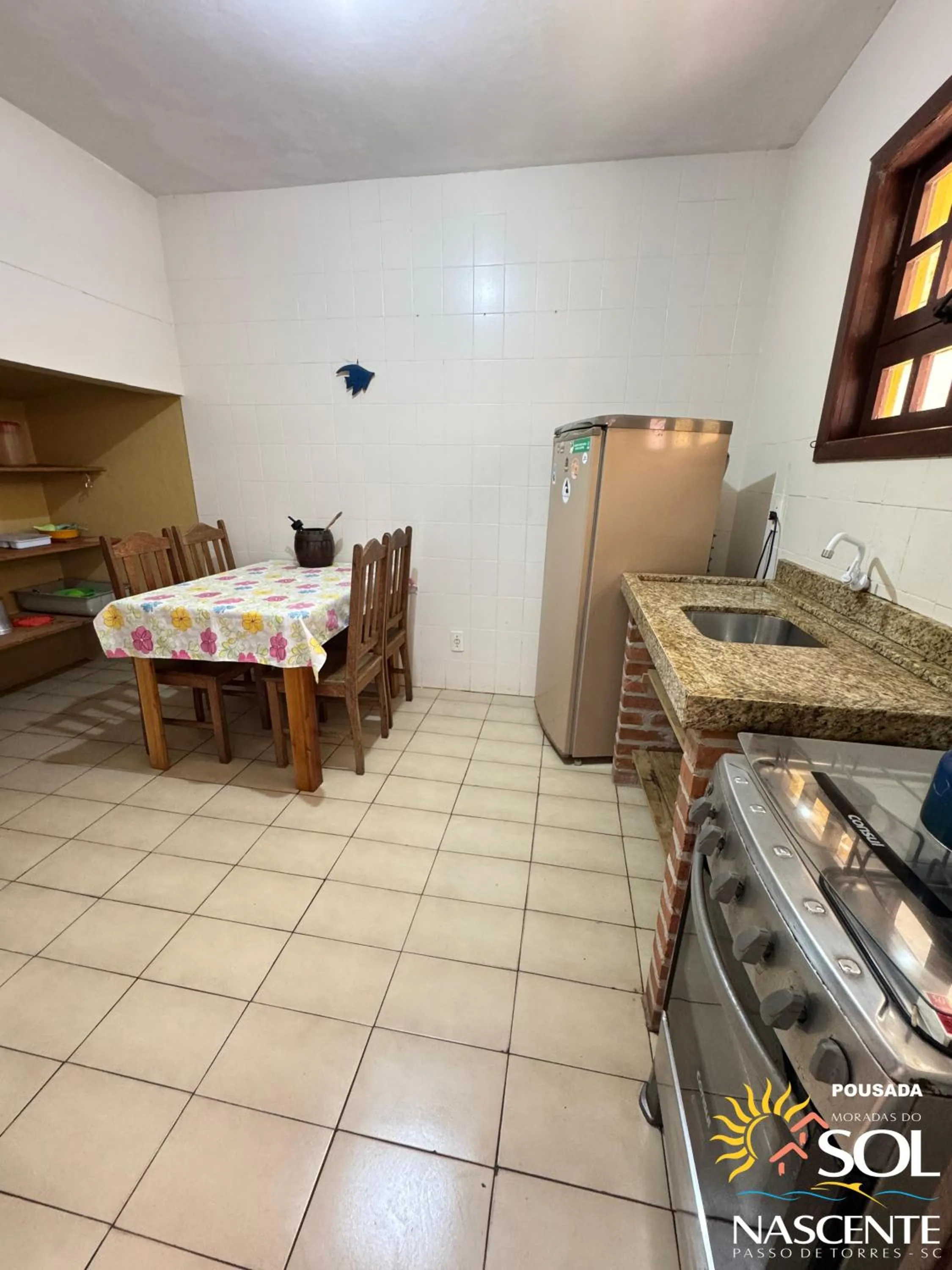 Kitchen or kitchenette in Pousada Moradas do Sol Nascente