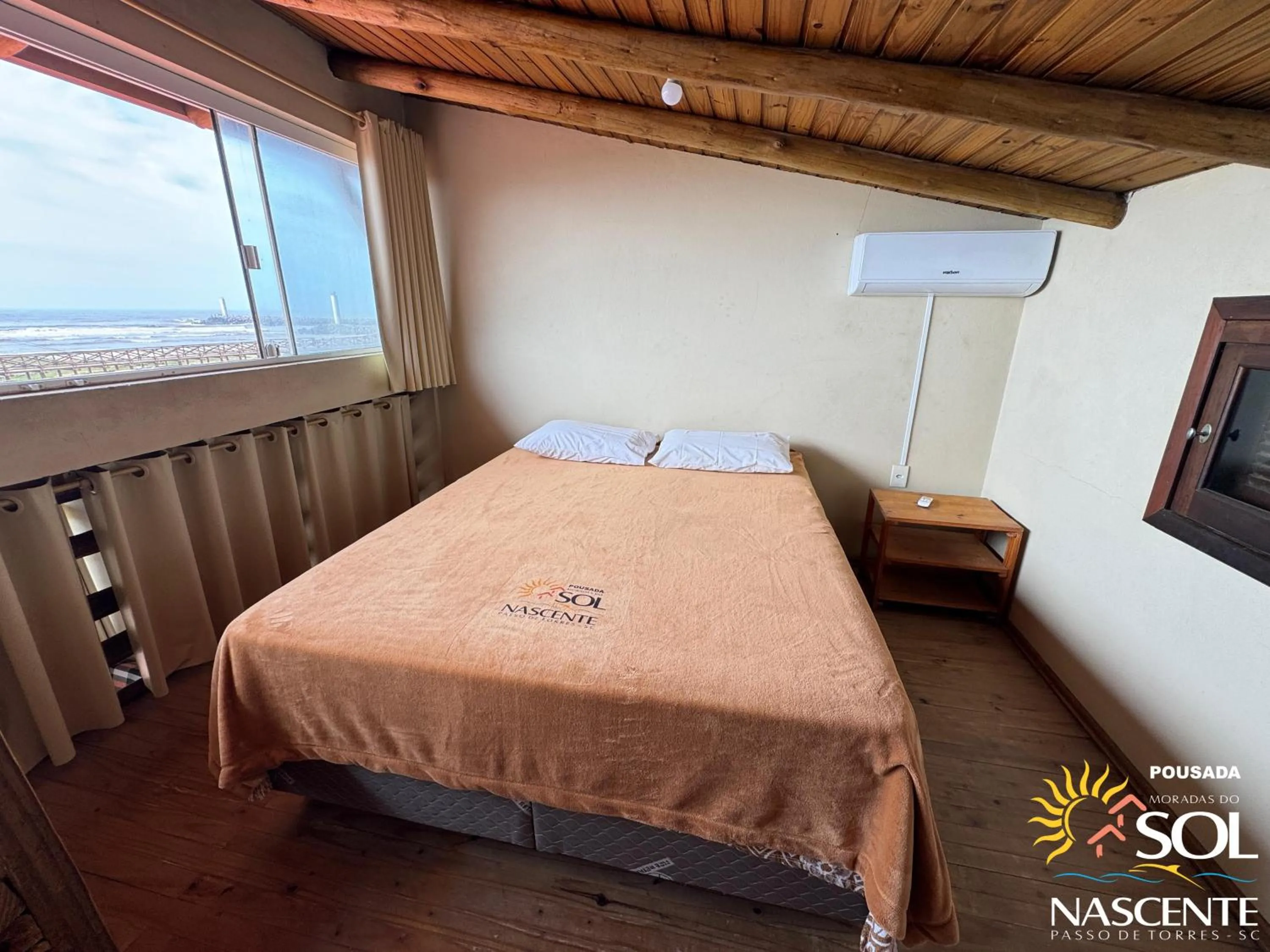 Photo of the whole room, Bed in Pousada Moradas do Sol Nascente