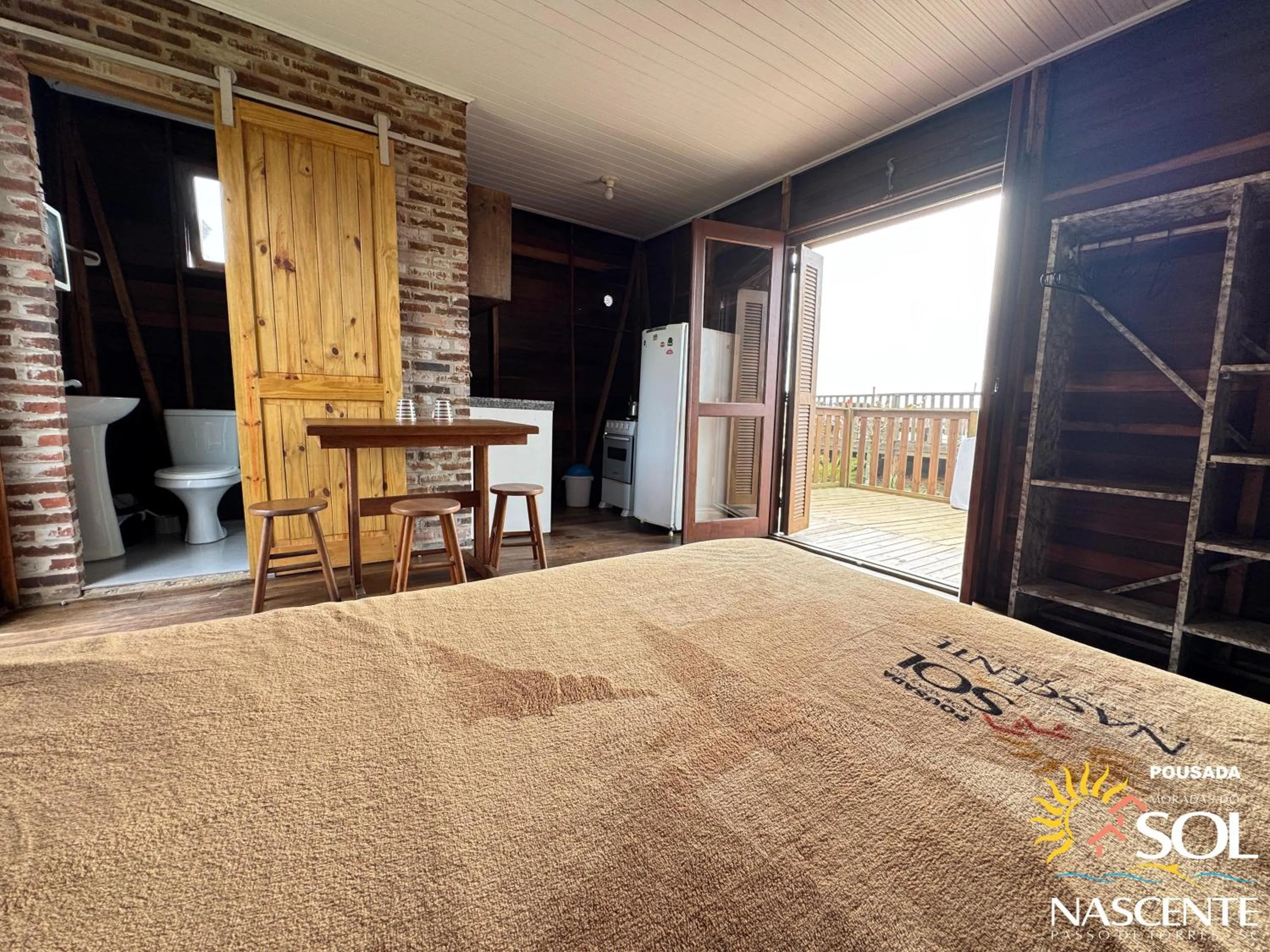 Photo of the whole room, Bed in Pousada Moradas do Sol Nascente