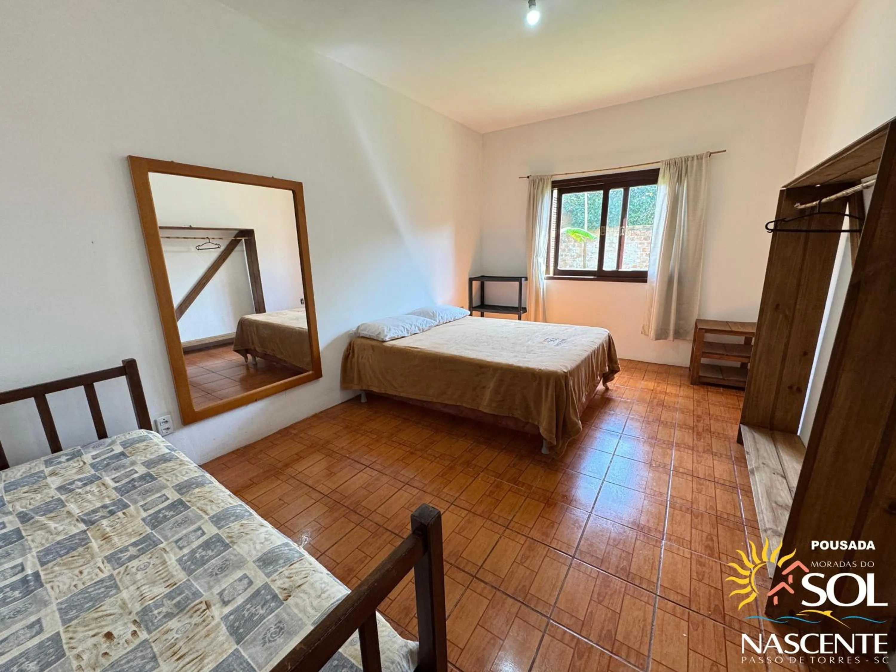 Photo of the whole room, Bed in Pousada Moradas do Sol Nascente