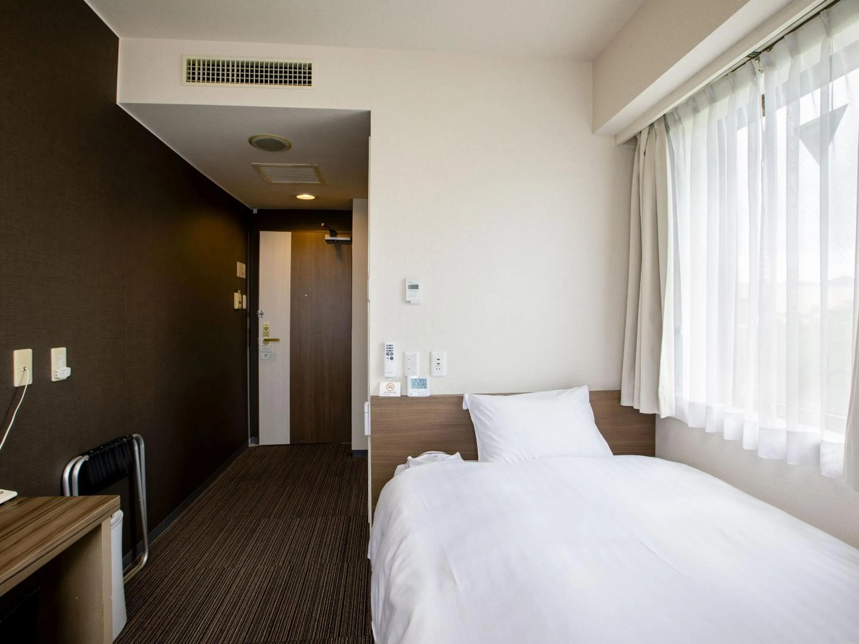 Photo of the whole room, Bed in KOKO STAY Hitachi- formerly Hotel Wing International Hitachi