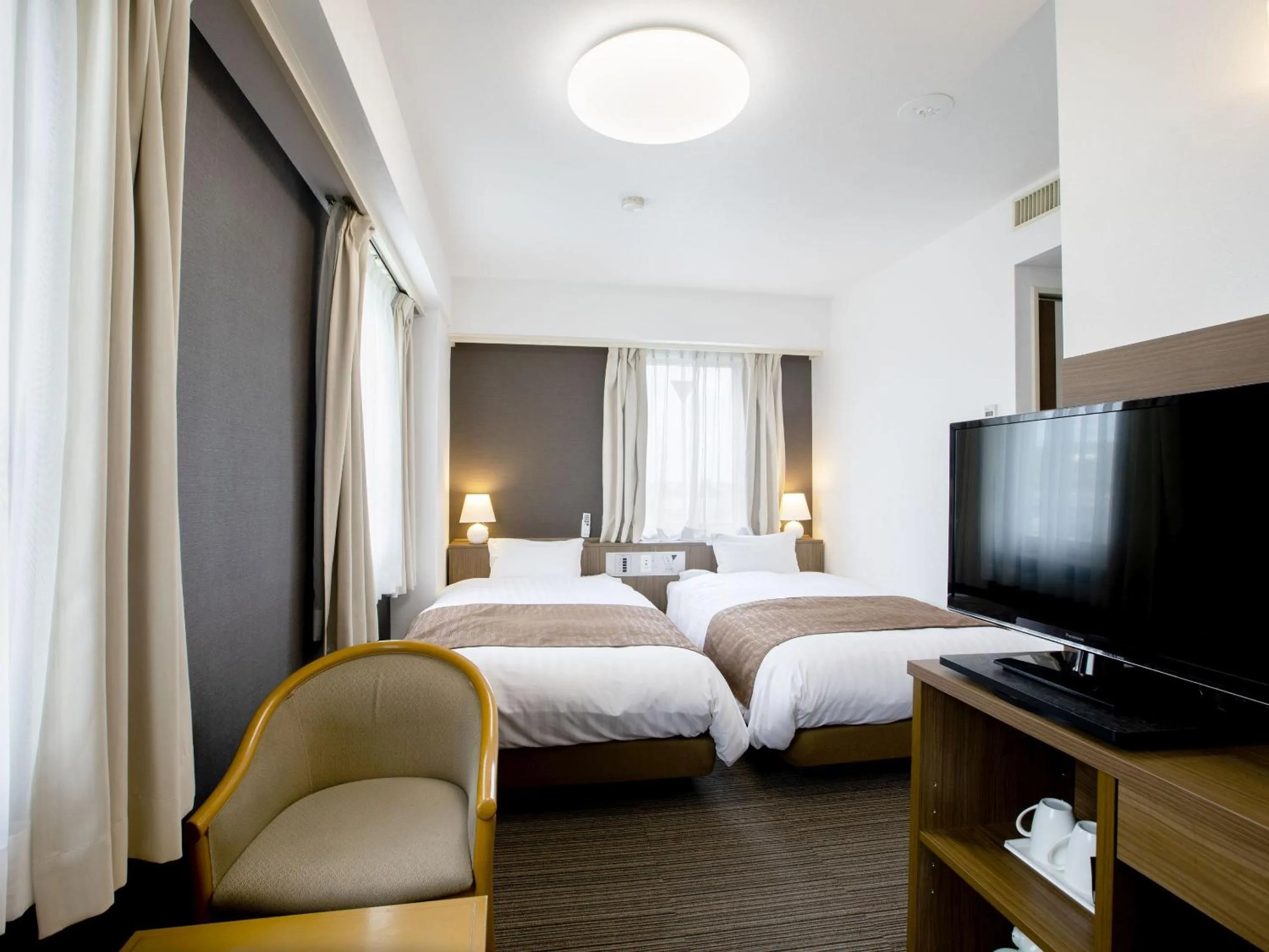 Photo of the whole room, Bed in KOKO STAY Hitachi- formerly Hotel Wing International Hitachi