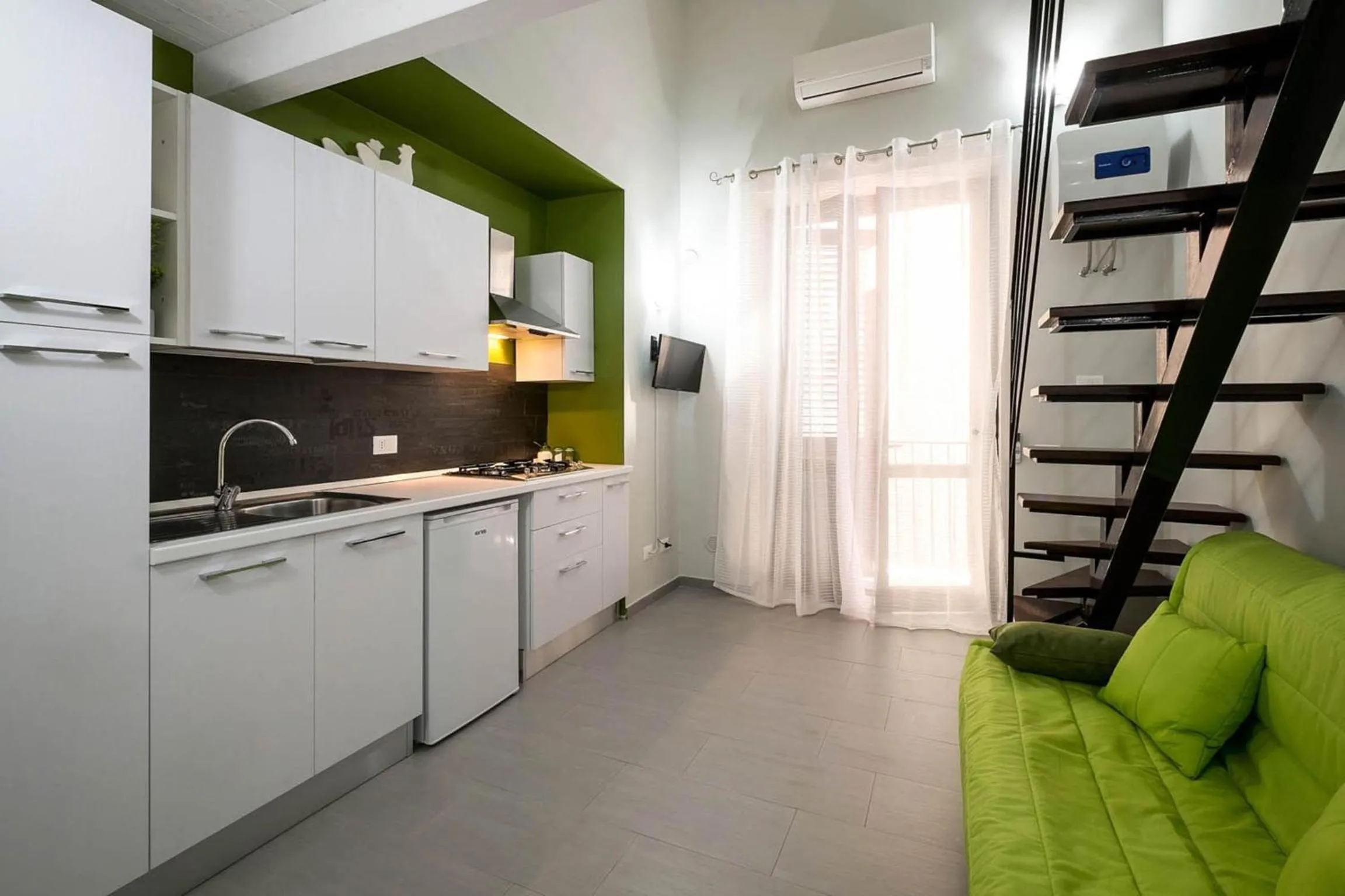 Kitchen or kitchenette in Quattro Canti Apartments