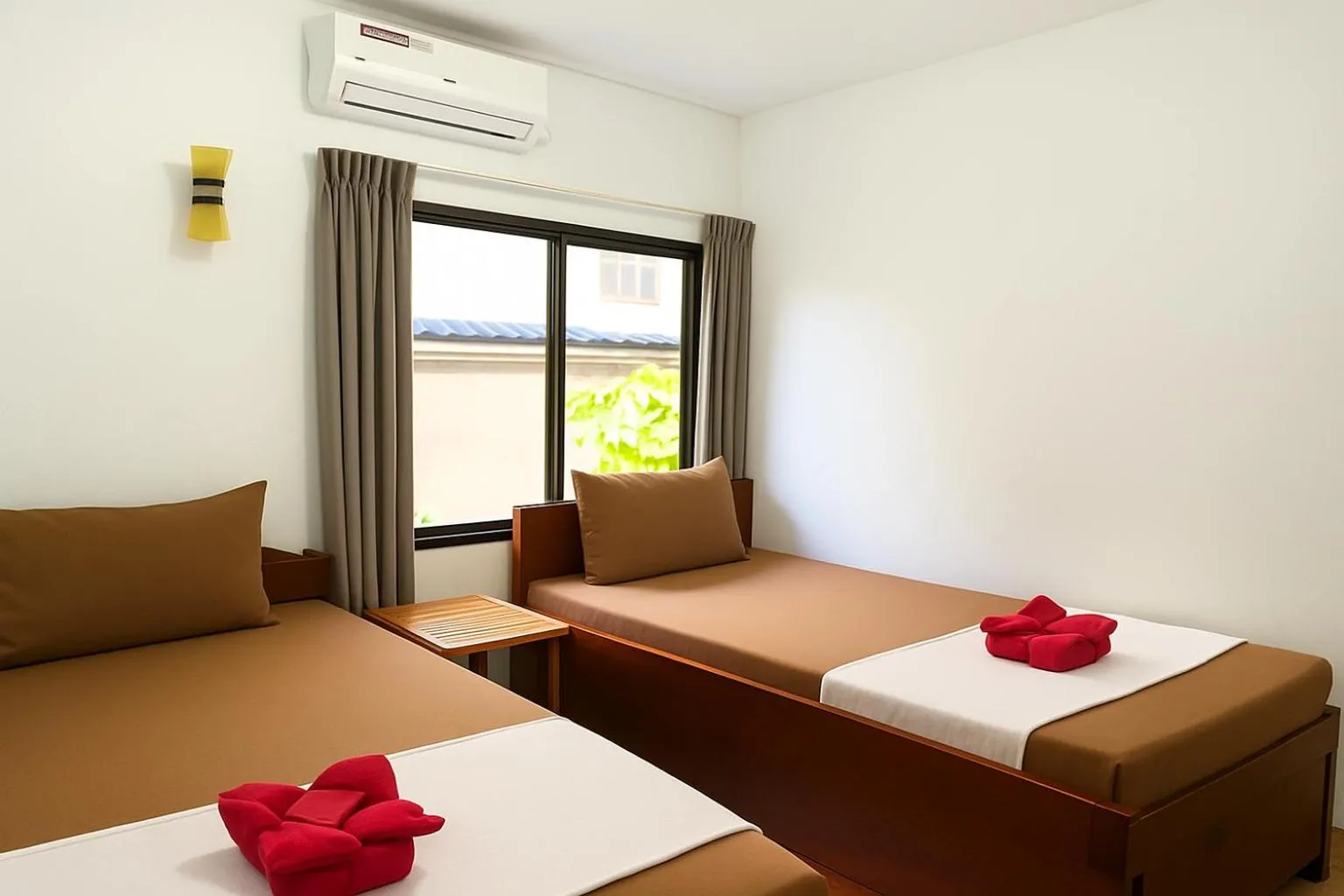 Bed in Happy Elephant Bungalows