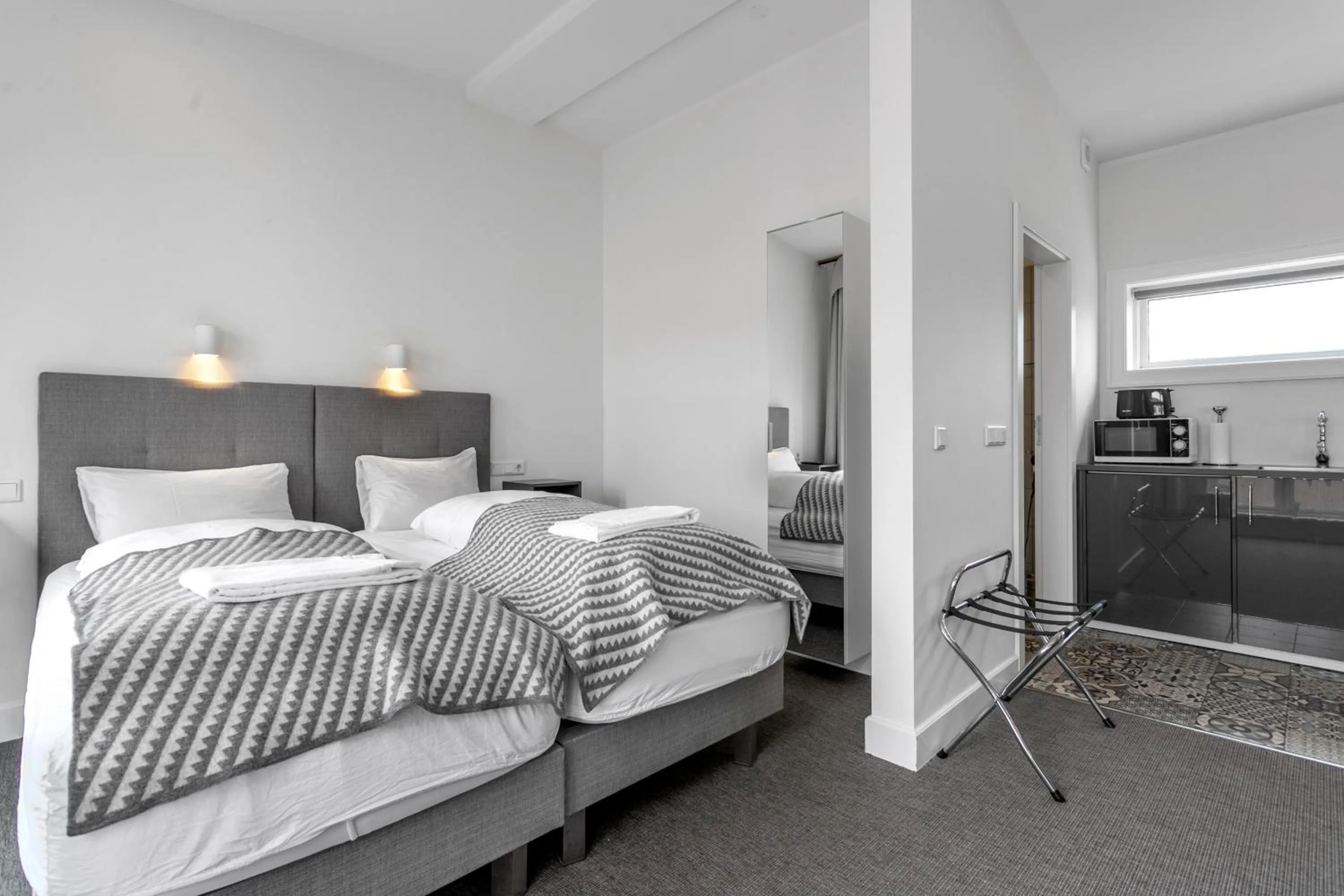 Bed in Ice Apartments Reykjavik by Heimaleiga