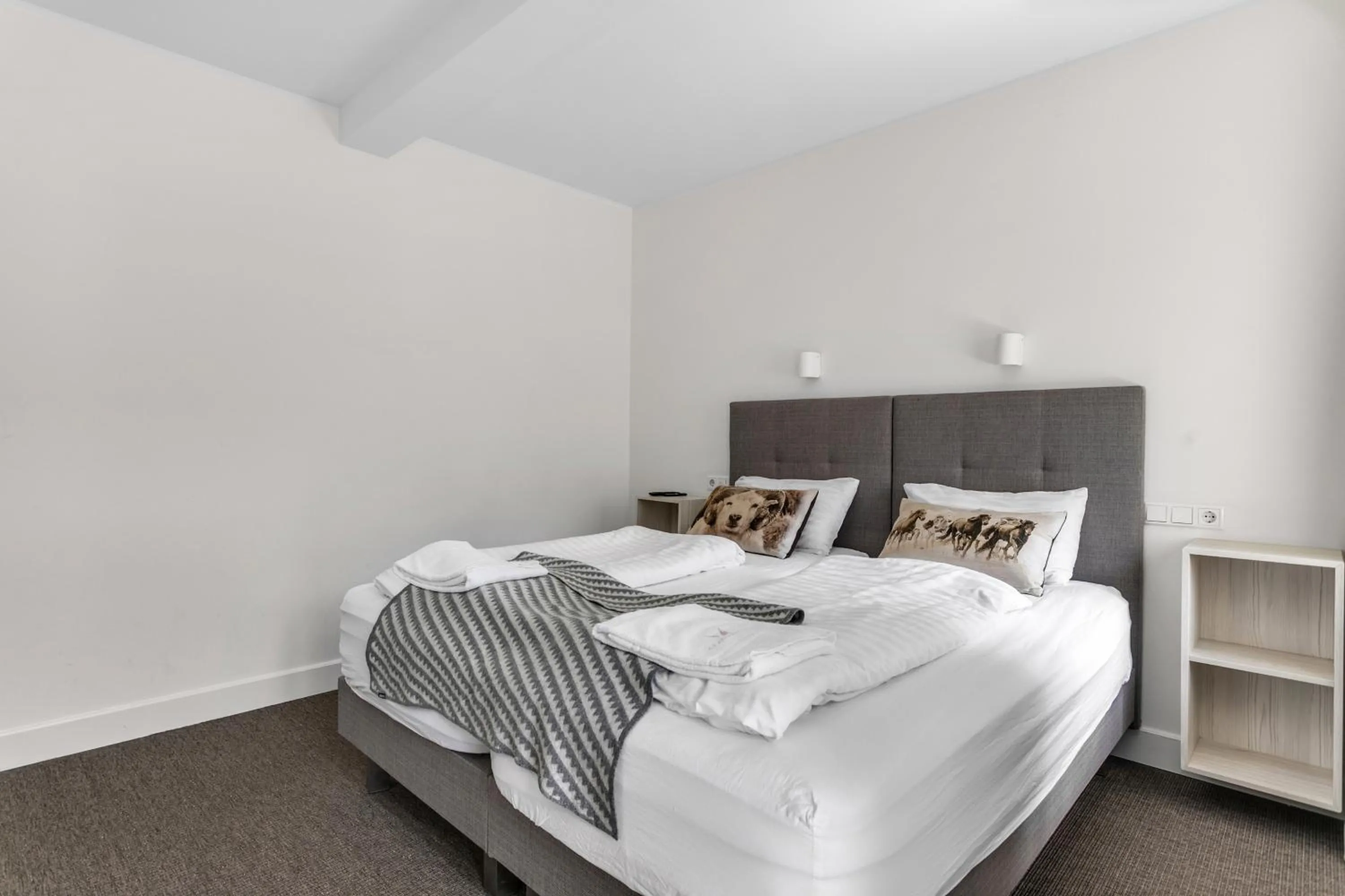 Bed in Ice Apartments Reykjavik by Heimaleiga