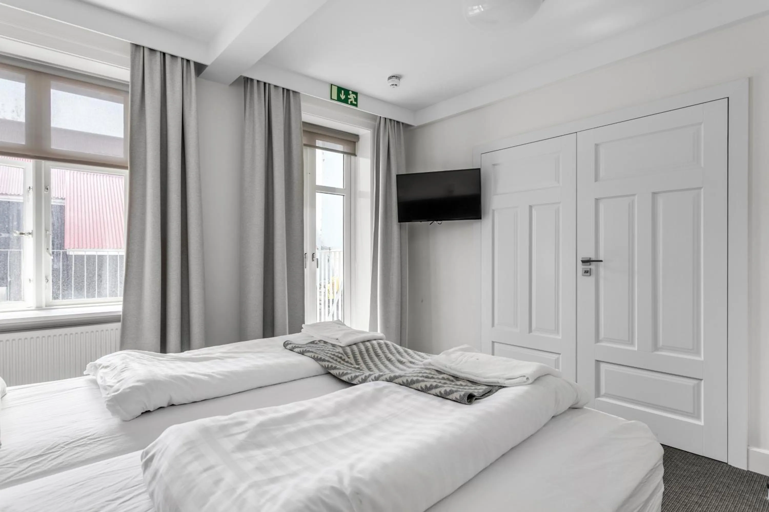 Bed in Ice Apartments Reykjavik by Heimaleiga