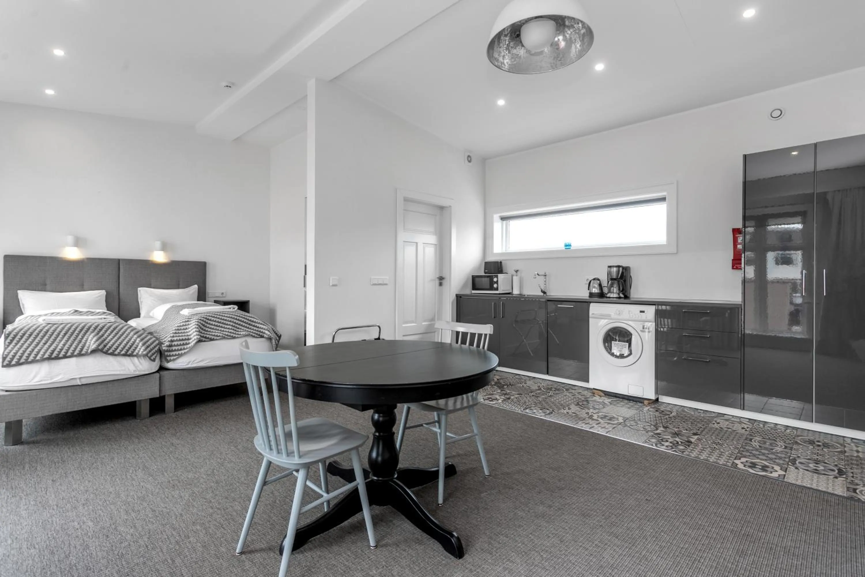 Bed in Ice Apartments Reykjavik by Heimaleiga