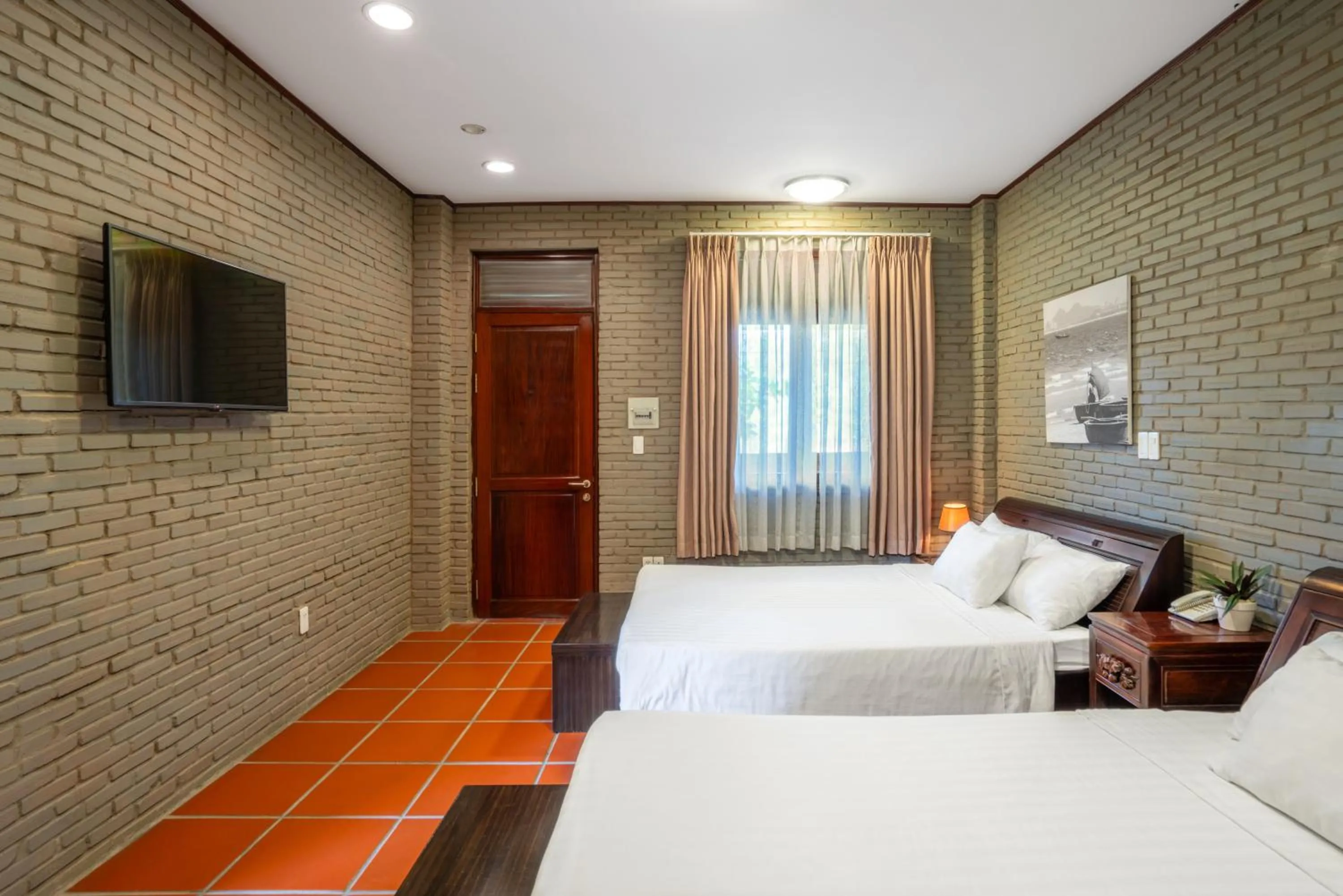 Bed in Mekong Long Thanh Resort & Reststop