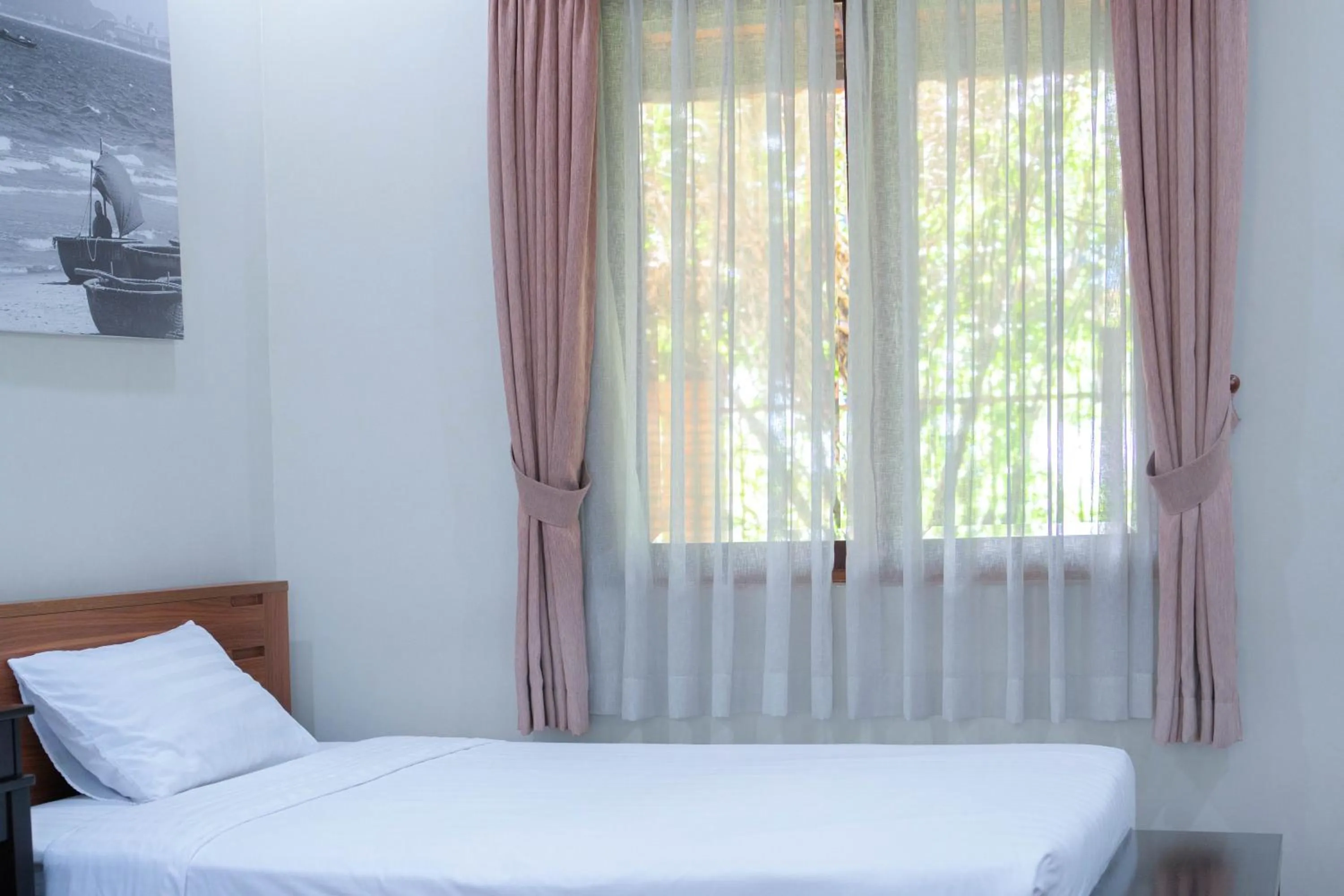 Bed in Mekong Long Thanh Resort & Reststop