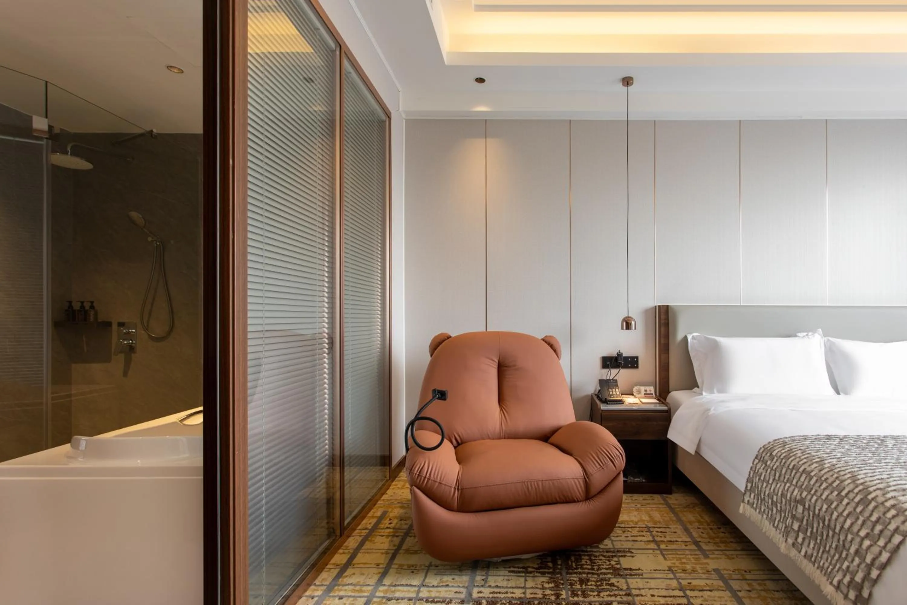 Seating area, Bed in Fortune Land Shenzhen