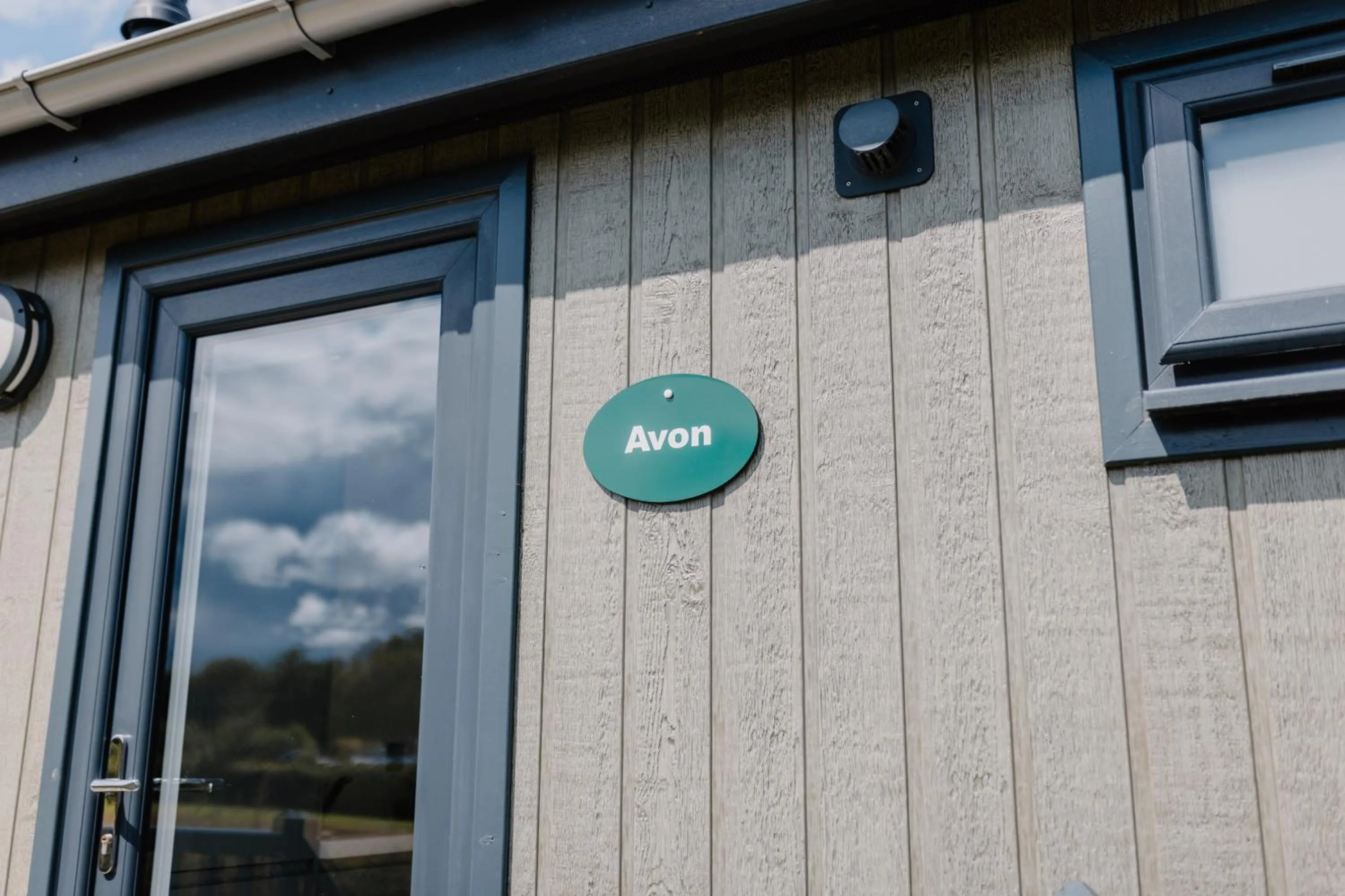 Property logo or sign in Linwater Caravan Park - Luxury Lodges and Static Caravans near Edinburgh