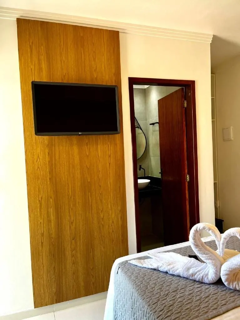 Bed in Pousada Concha Dourada