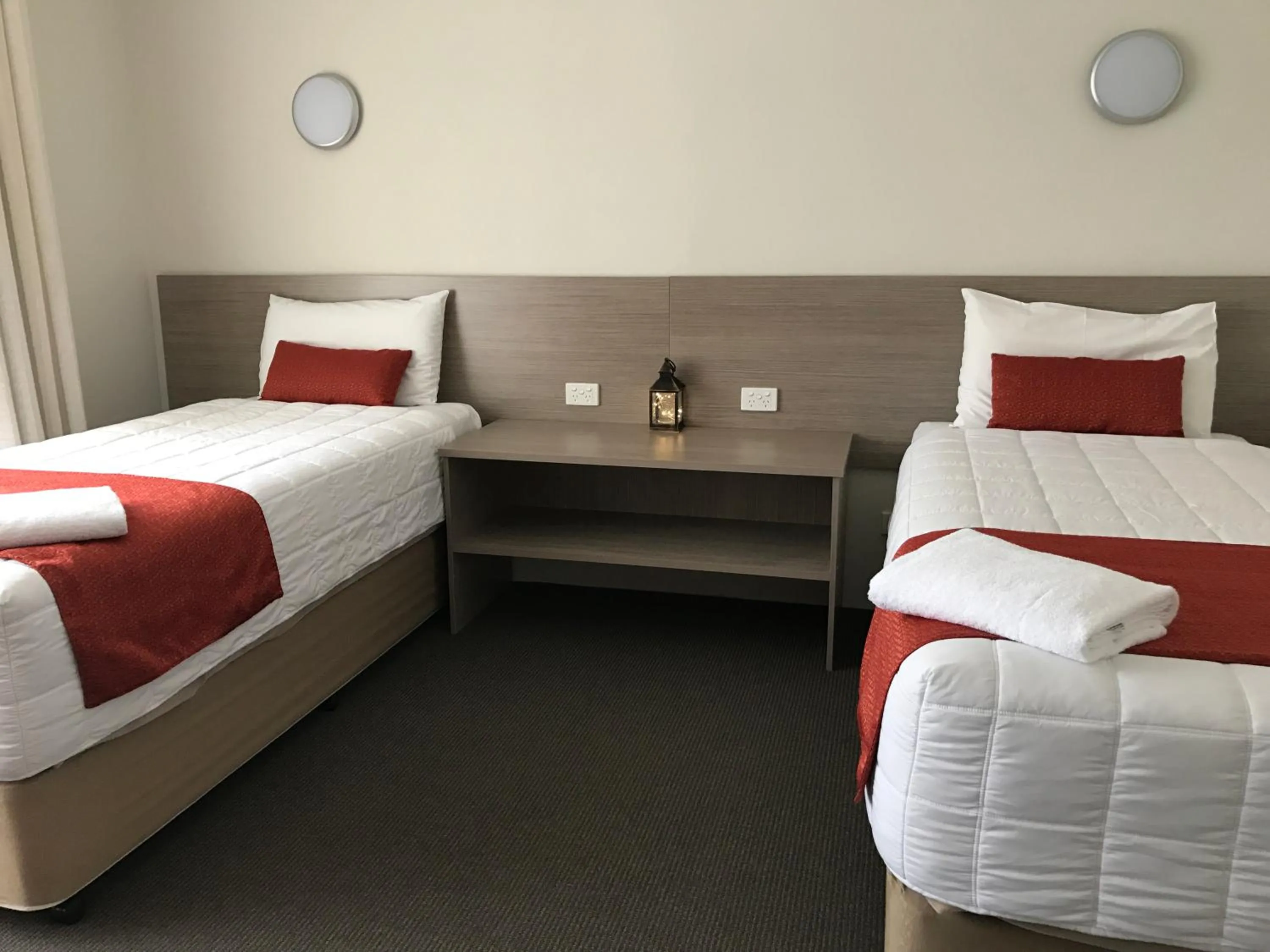 Bed in Acacia Motor Lodge