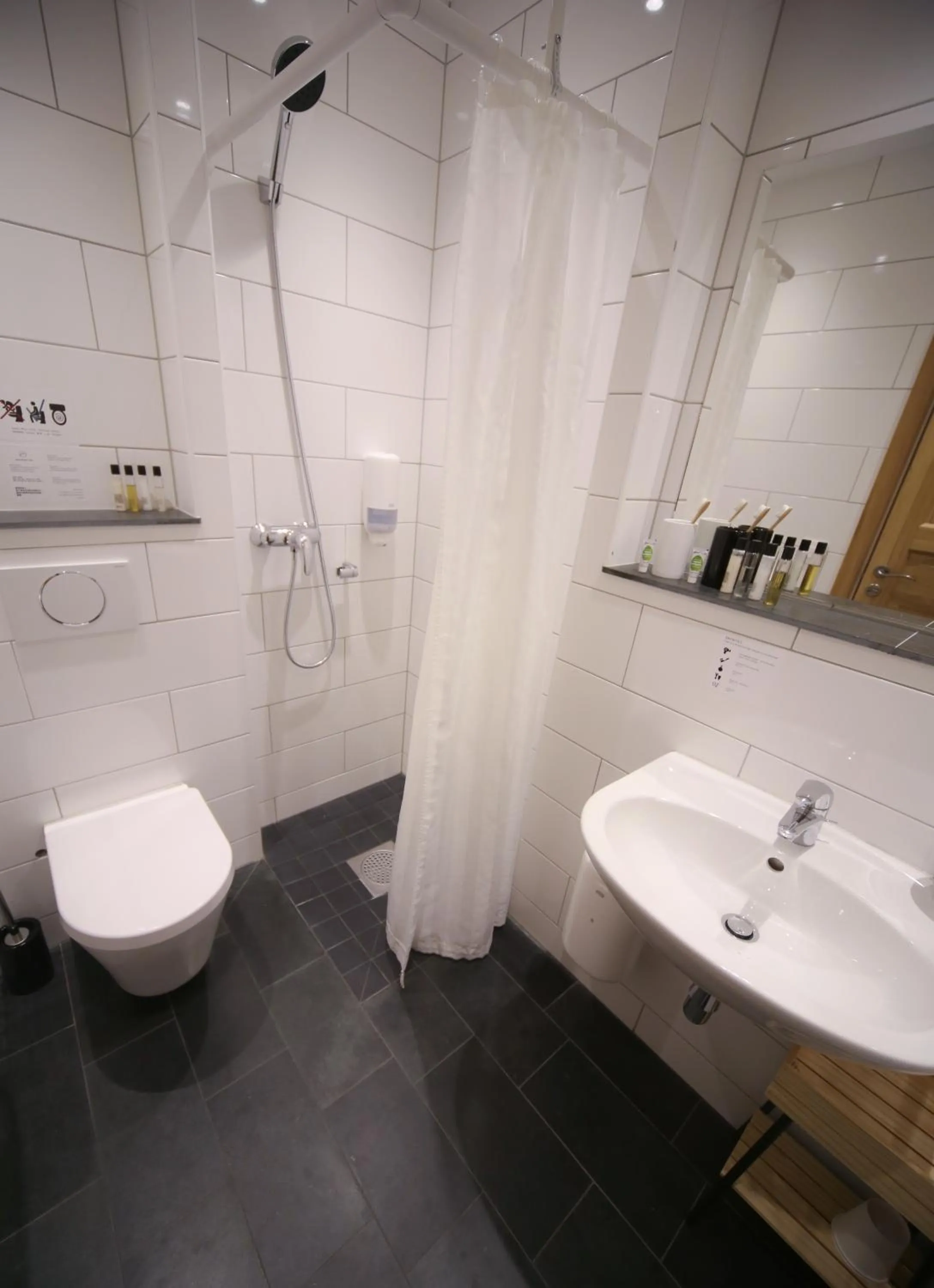 Bathroom in GRAND your home with common kitchens with self check-in