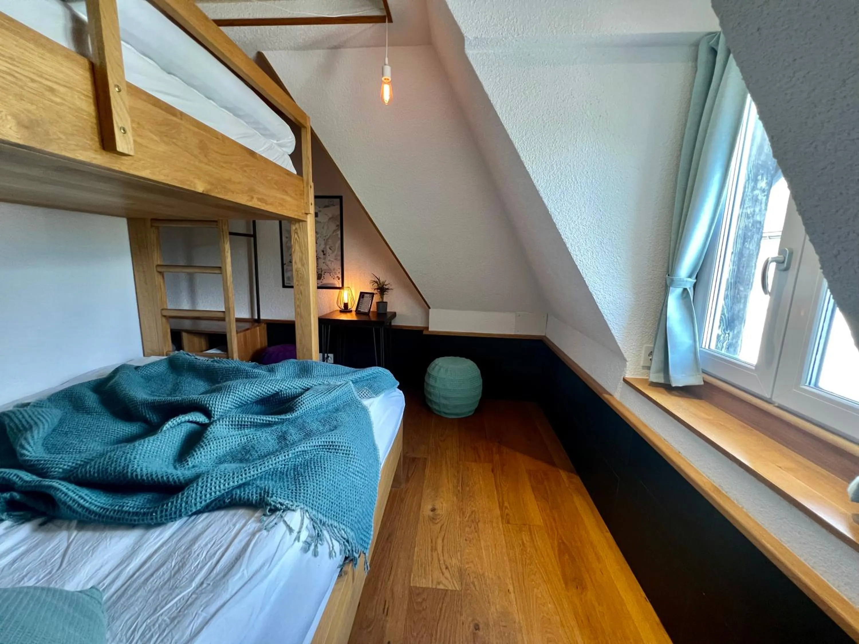 Seating area, Bed in GRAND your home with common kitchens with self check-in