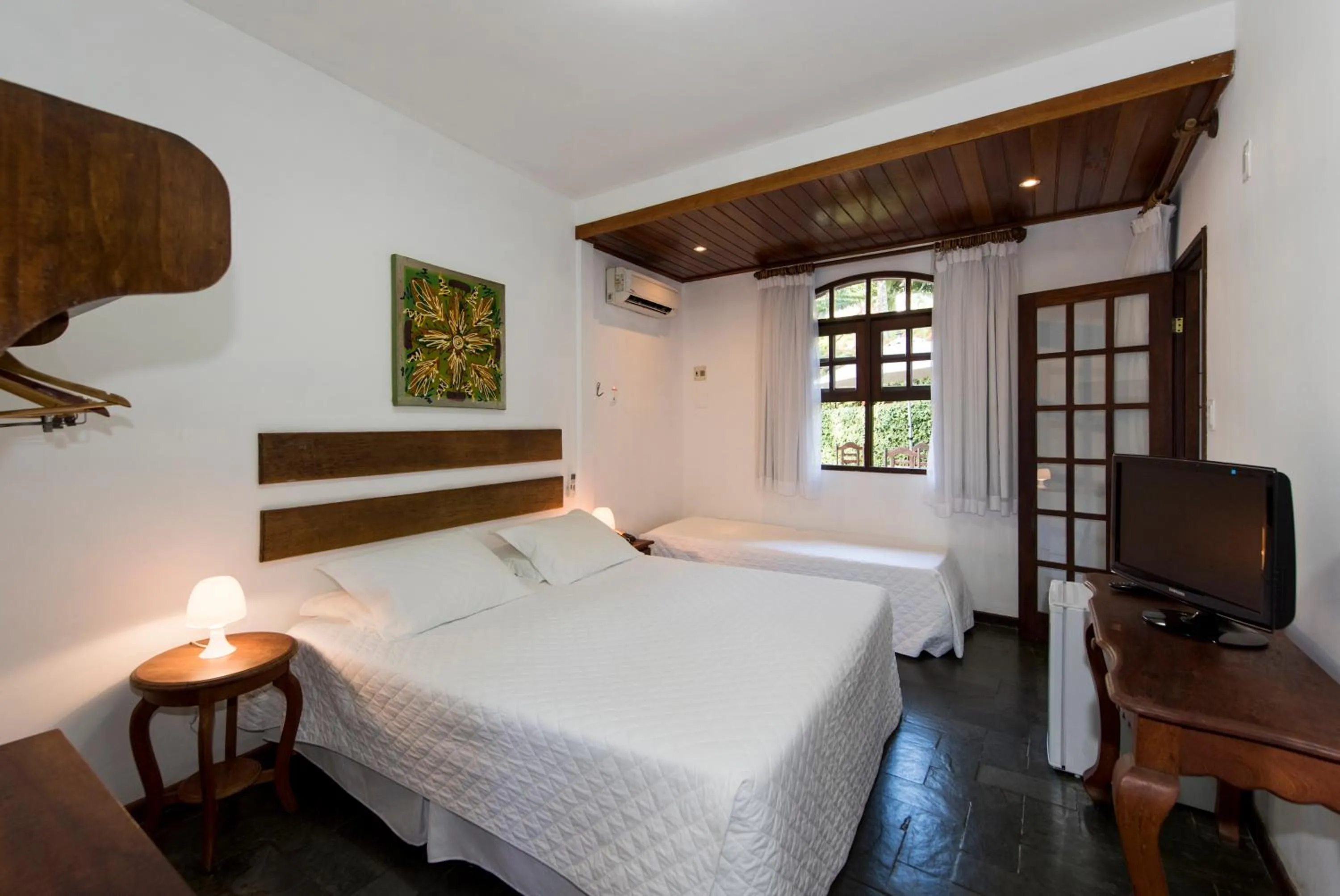 Bed in Pousada Natureza