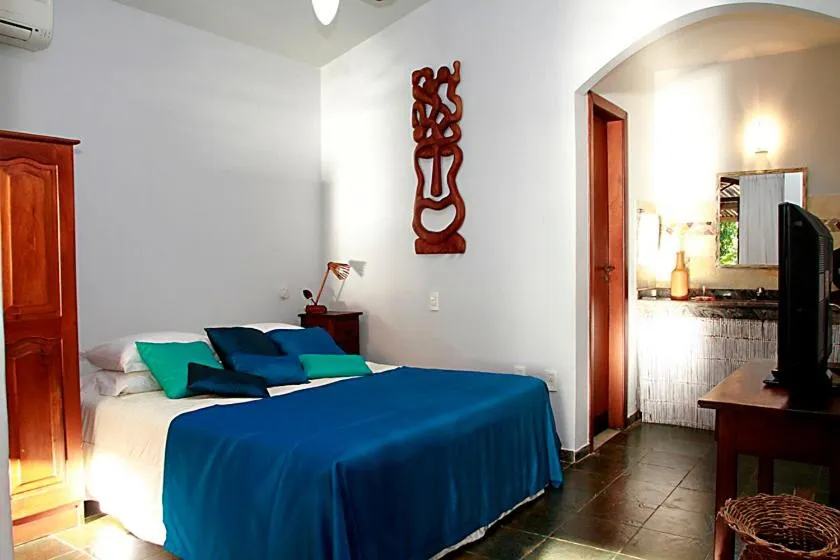 Bed in Pousada Natureza