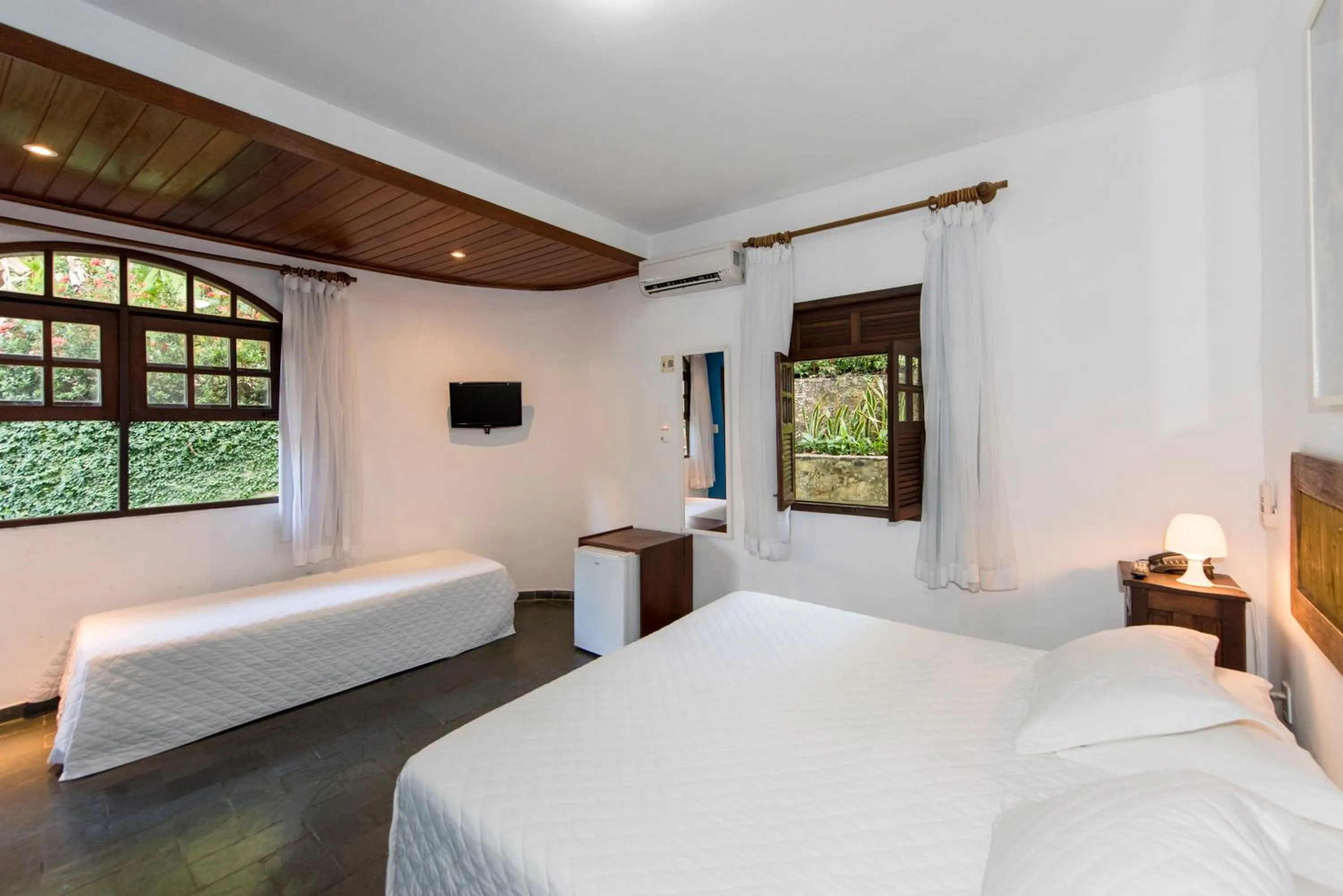 Bed in Pousada Natureza