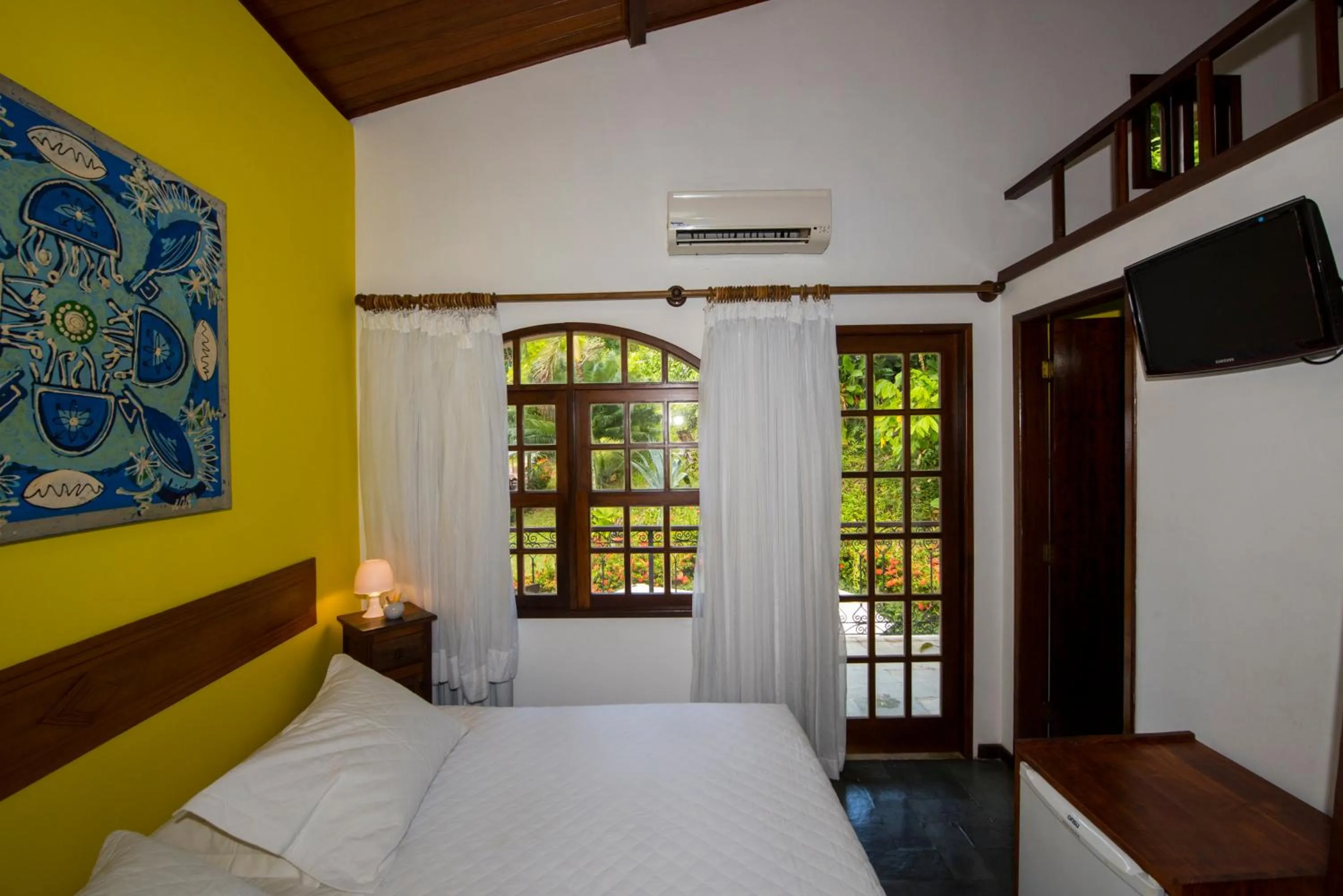 Bed in Pousada Natureza