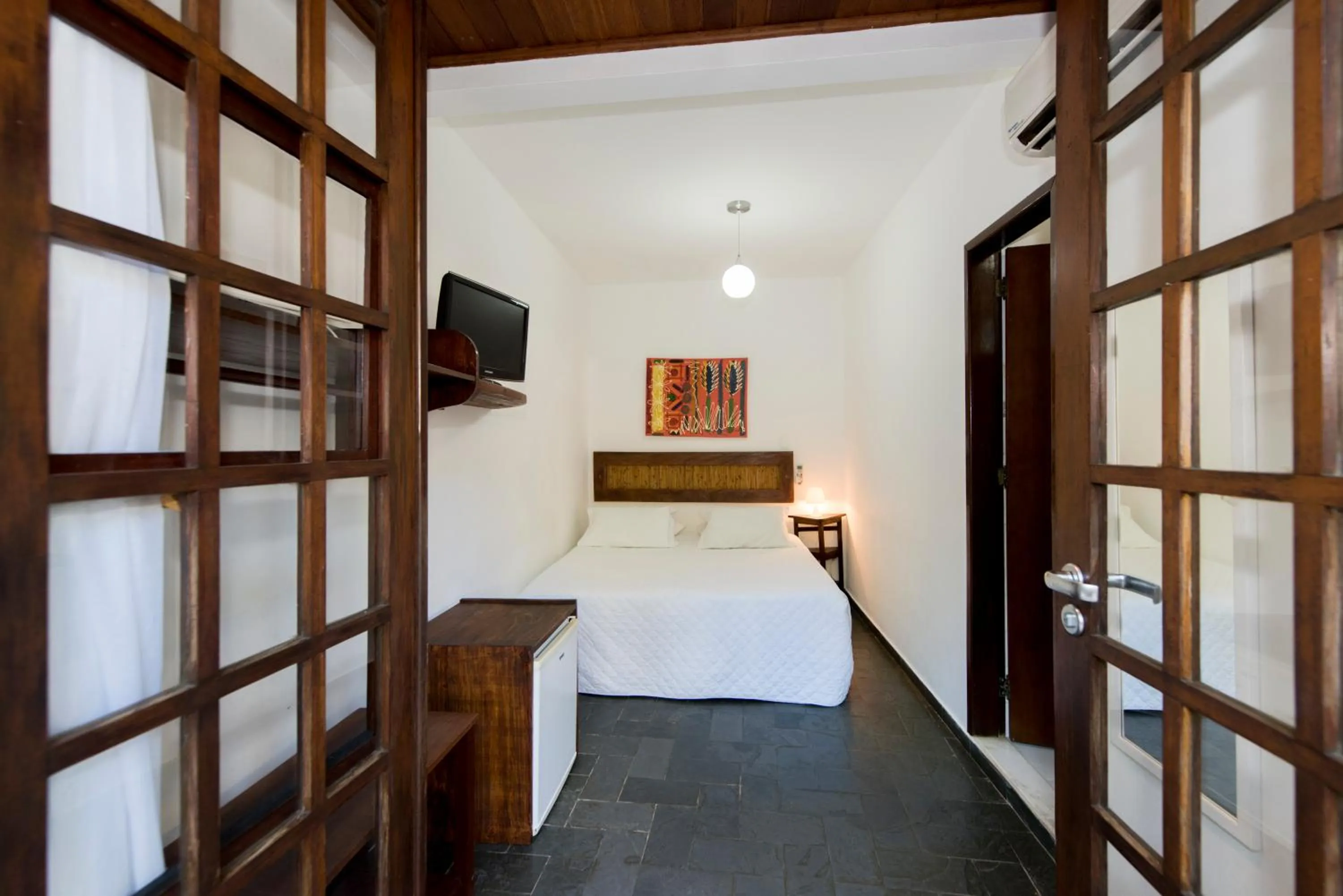 Bed in Pousada Natureza