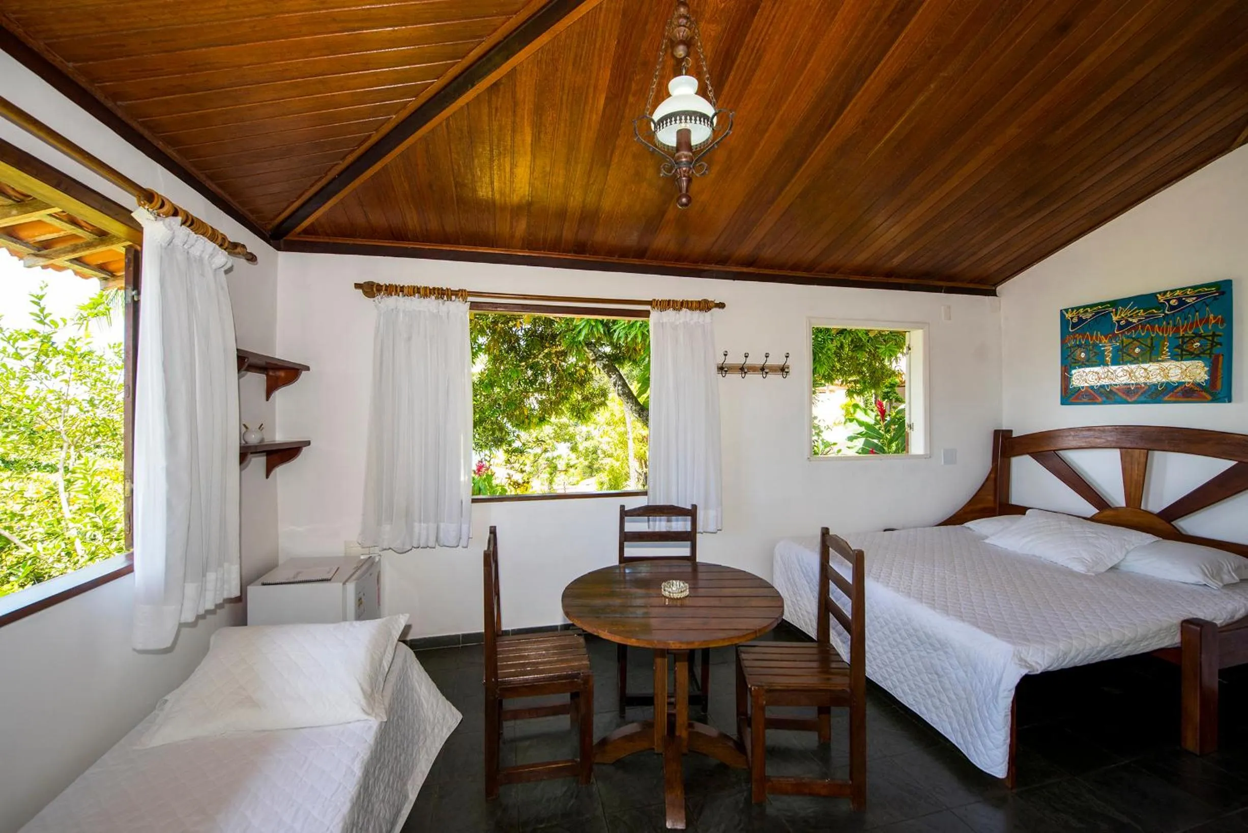 Living room, Bed in Pousada Natureza