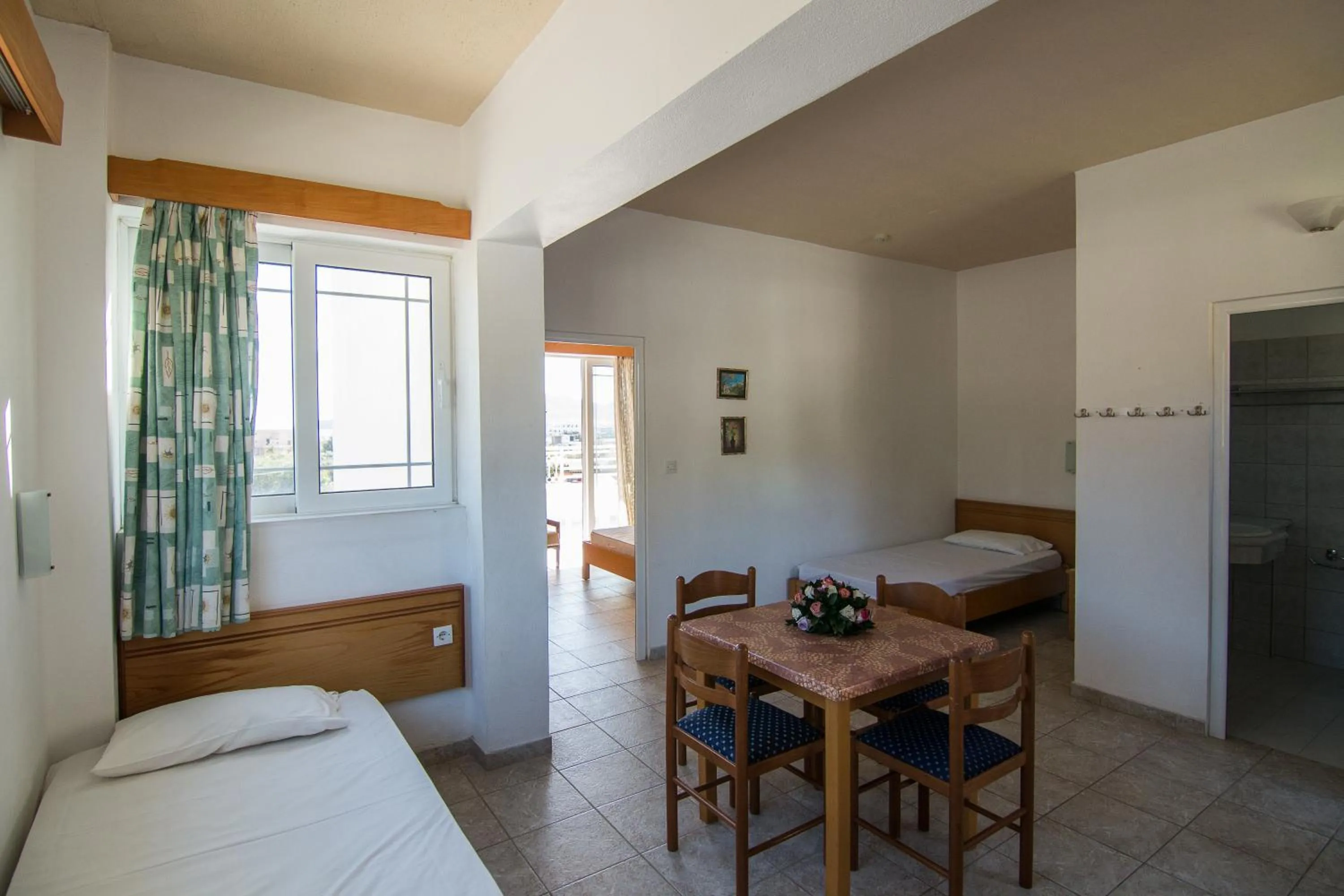 Kitchen or kitchenette, Bed in Faliraki Dream Studios & Apartments