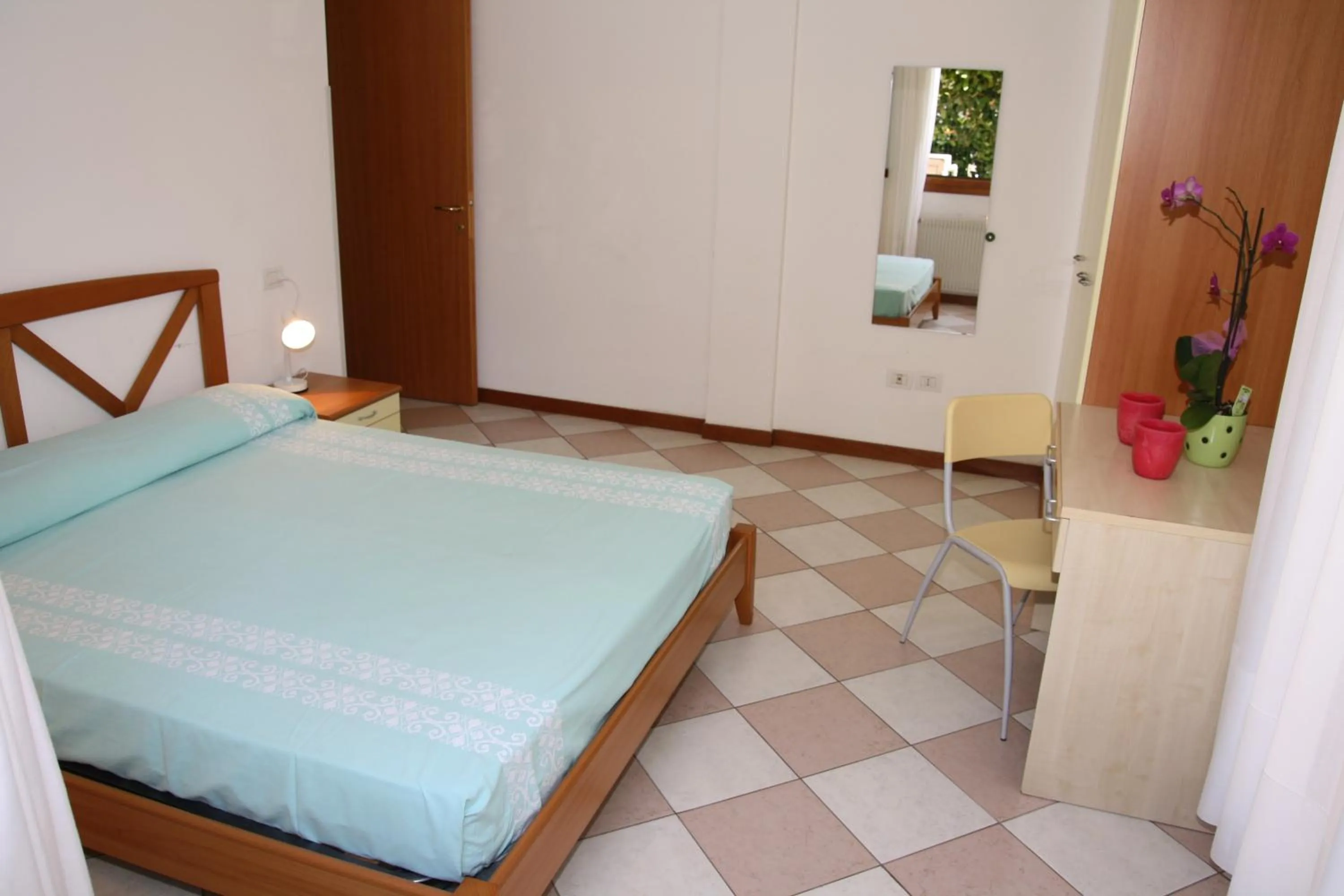 Photo of the whole room, Bed in Family Apartments Residence Trieste