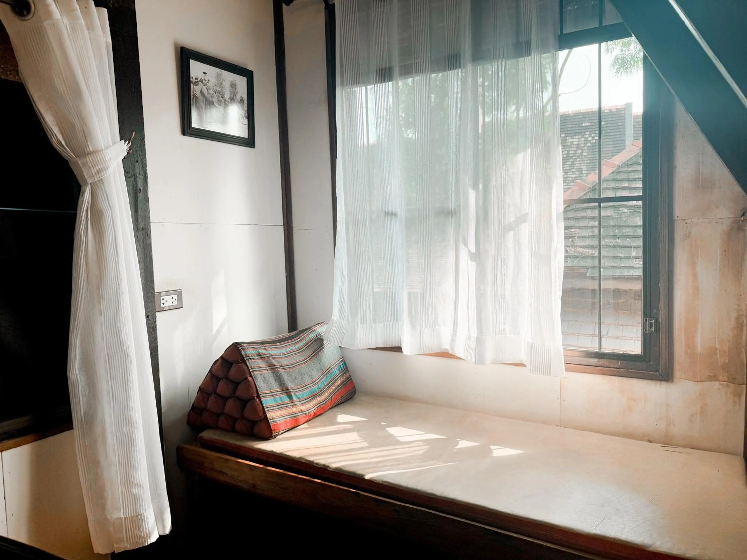 Photo of the whole room, Bed in Monfai Culture House