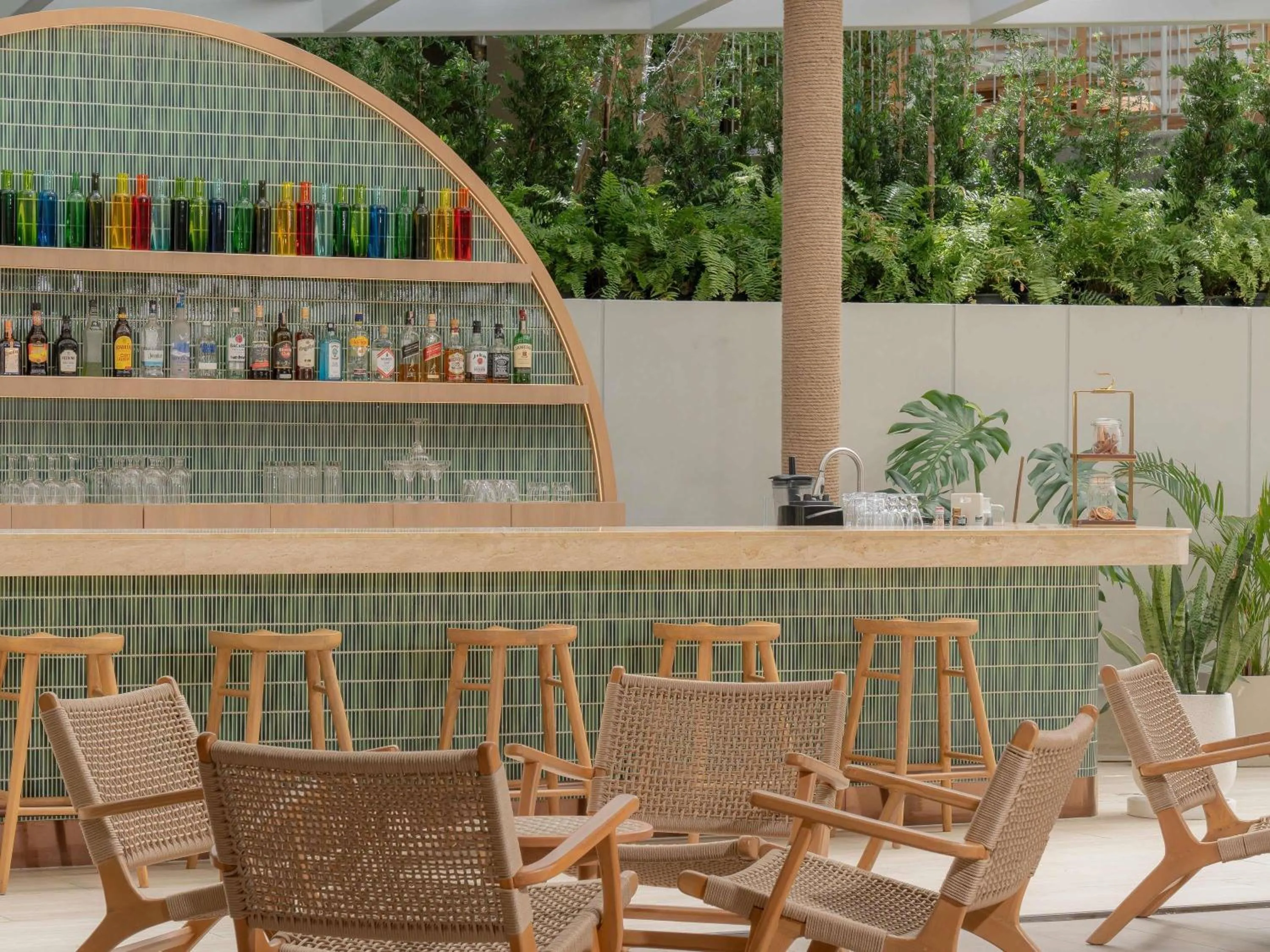 Lounge or bar in Andaman Beach Hotel Phuket - Handwritten Collection