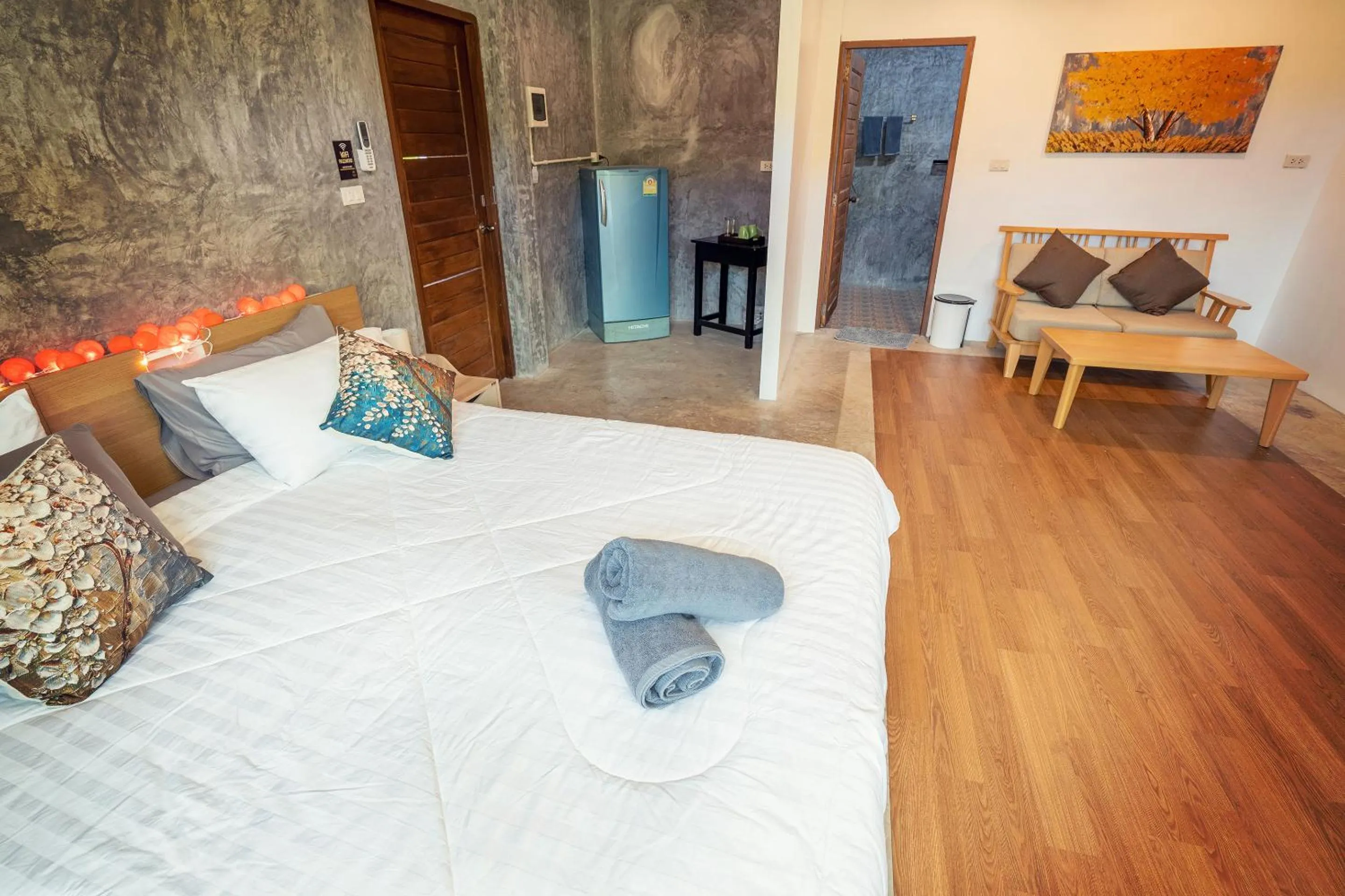 Bed in Tonmai Suites