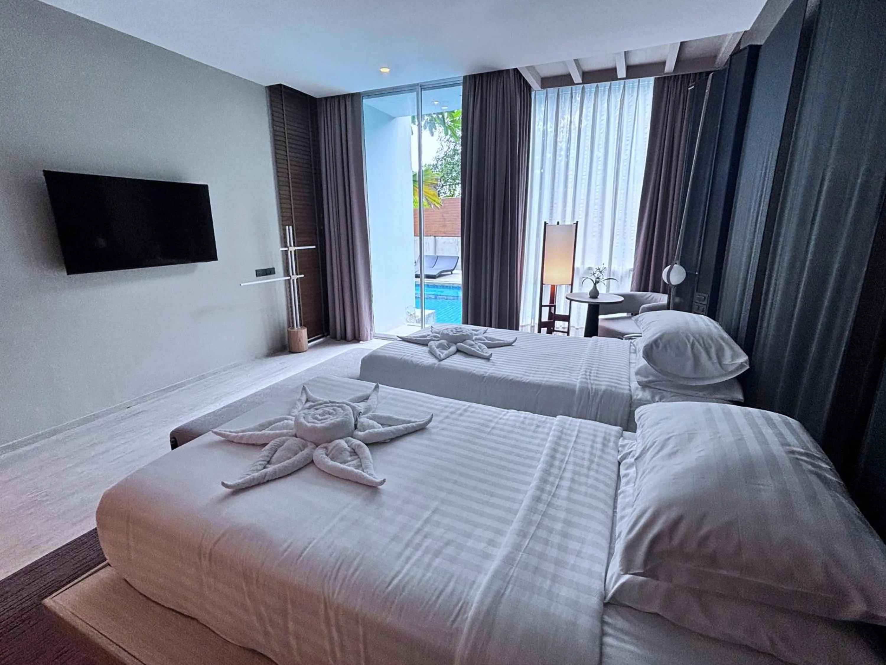 Photo of the whole room, Bed in Grand Vista Hotel Chiangrai