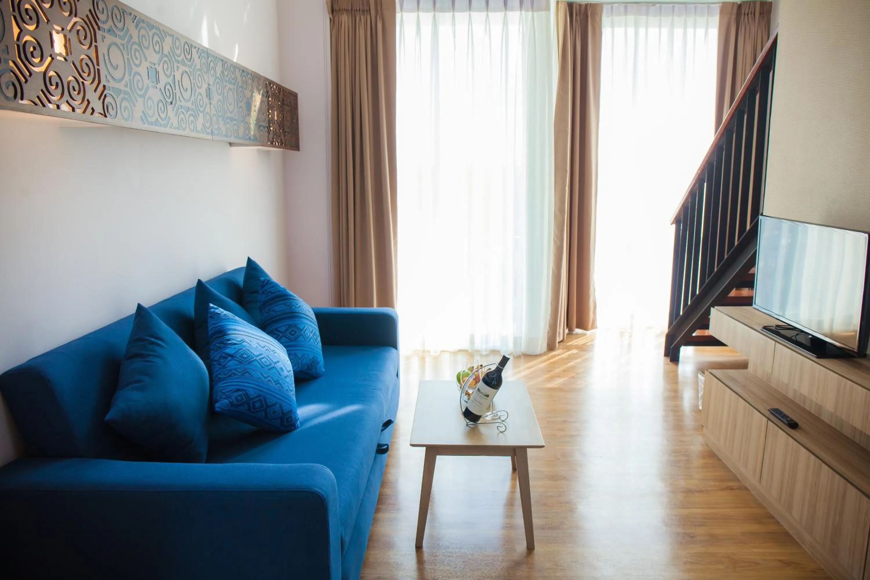 Living room in Grand Vista Hotel Chiangrai