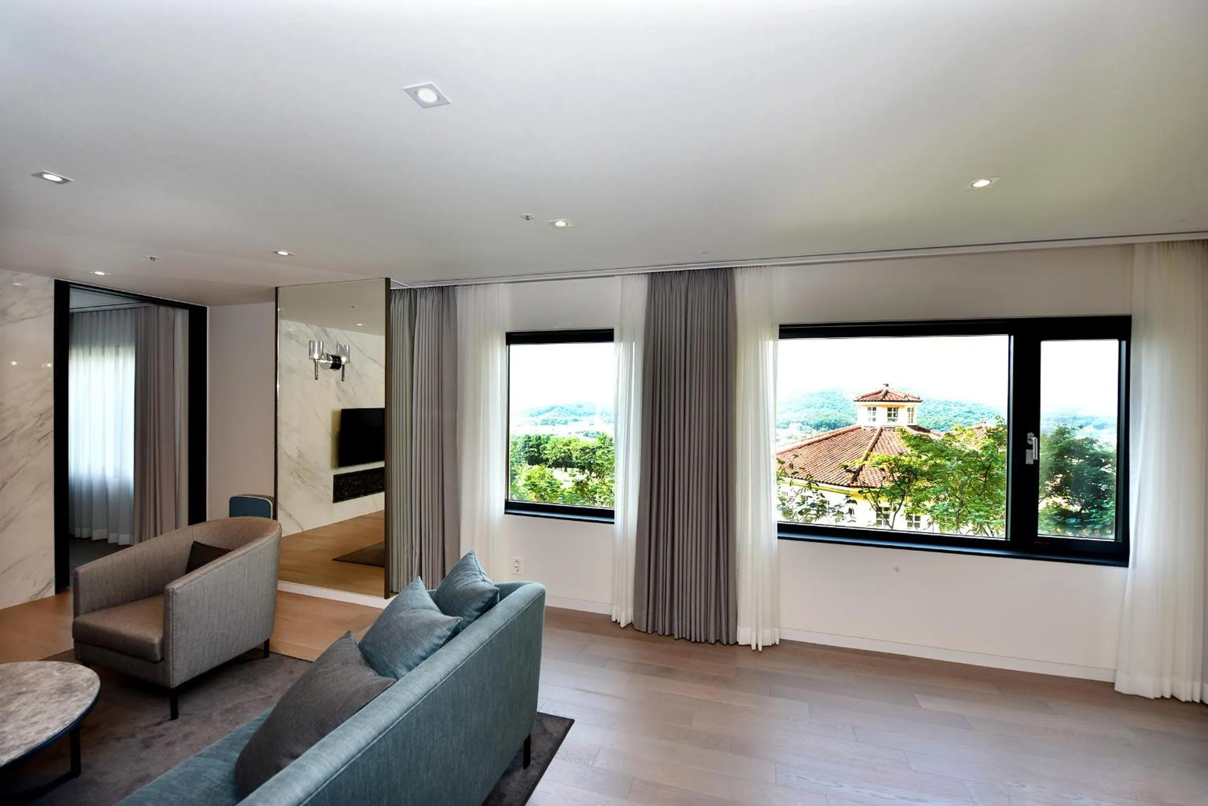 Living room in La Vie Dor Hotel and Resort, Trademark Collection by Wyndham