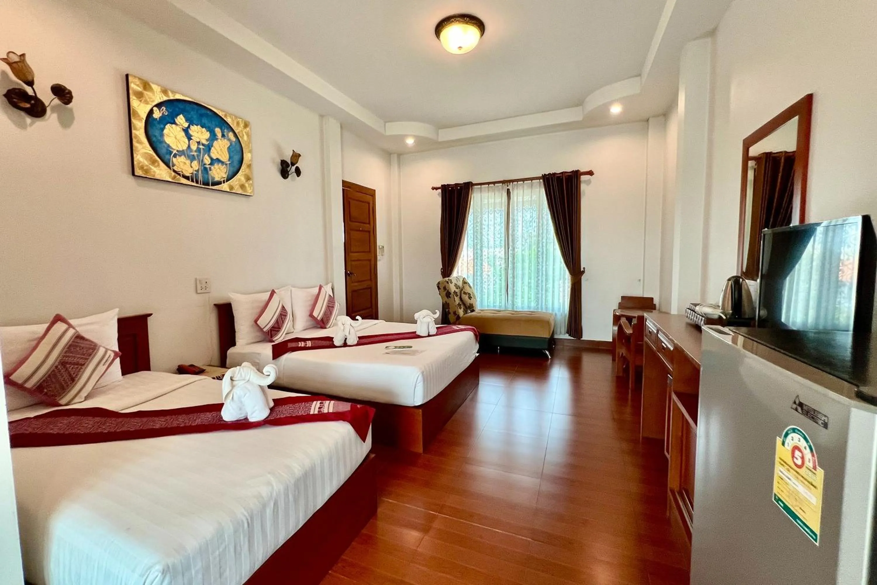 Bed in Sawadeelanna Hotel