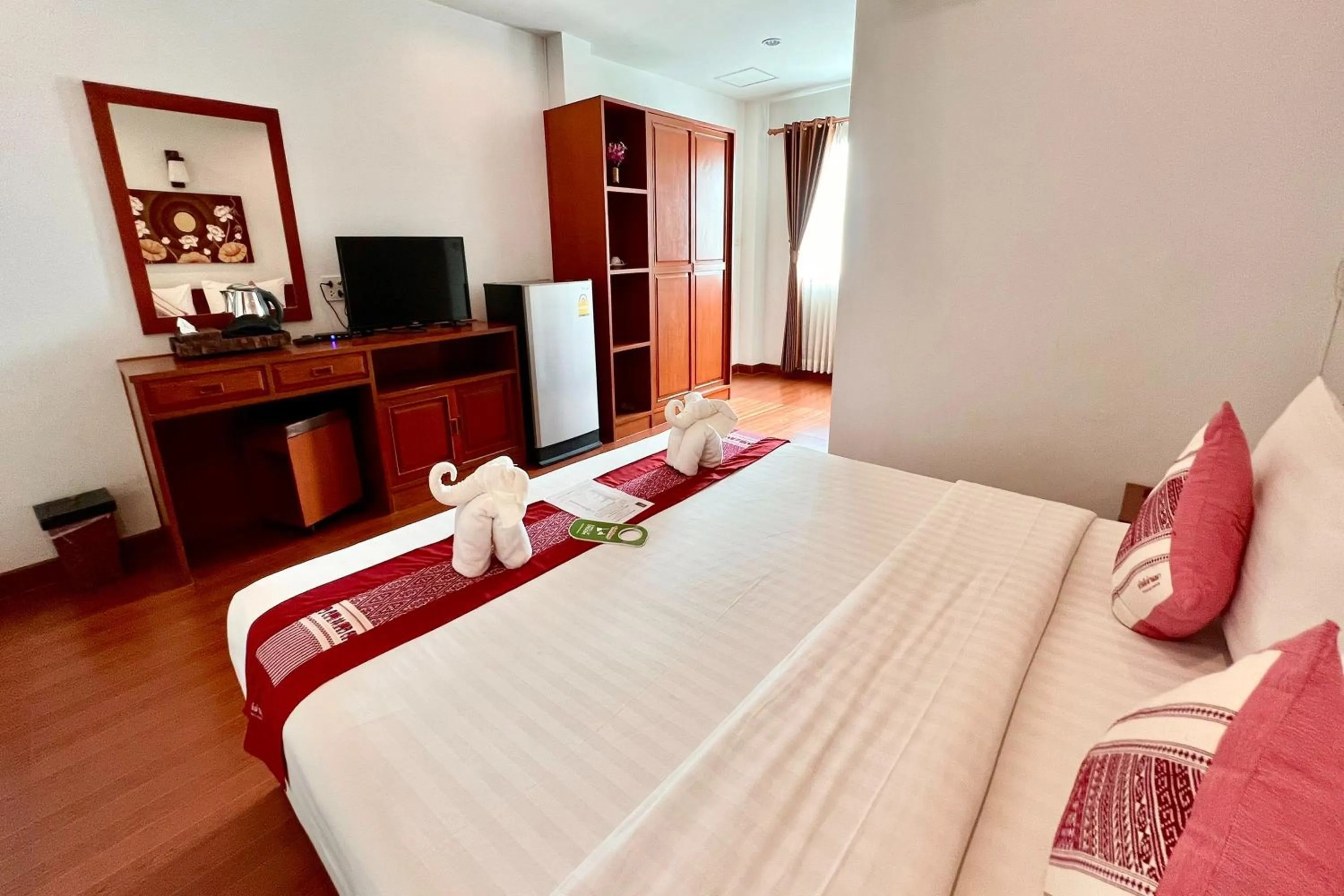 Bed in Sawadeelanna Hotel