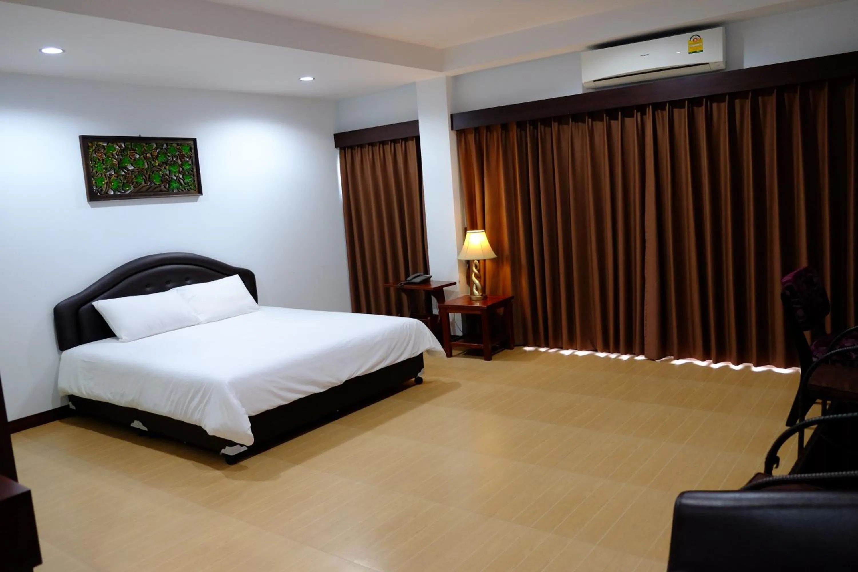 Bed in Evergreen Resort Chanthaburi