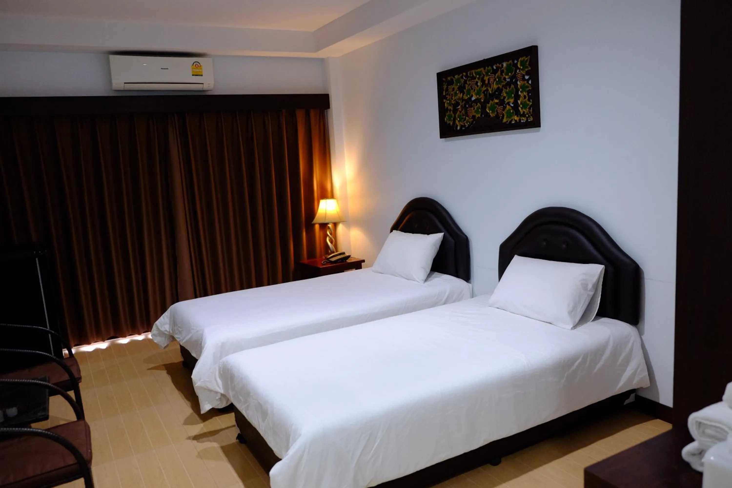 Bed in Evergreen Resort Chanthaburi