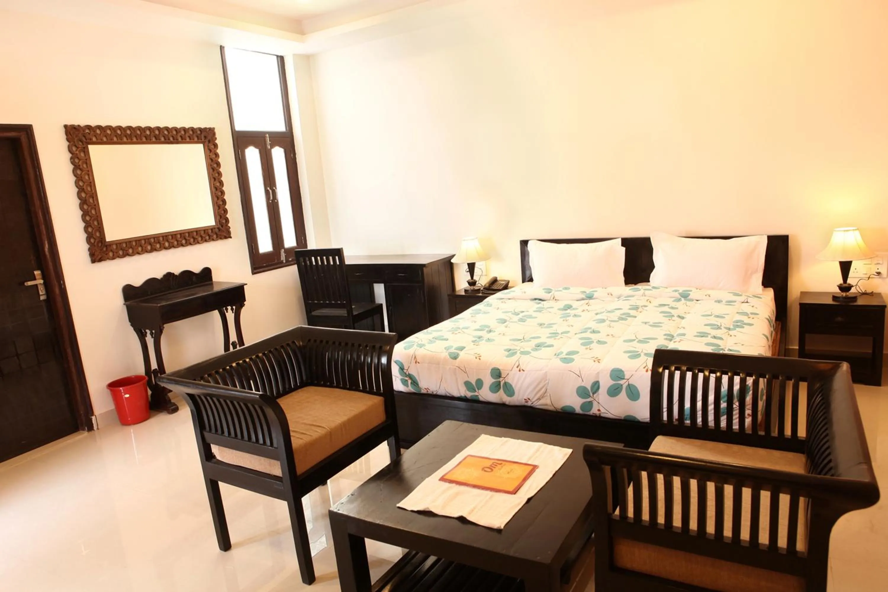 Bed in Om Heritage Haveli