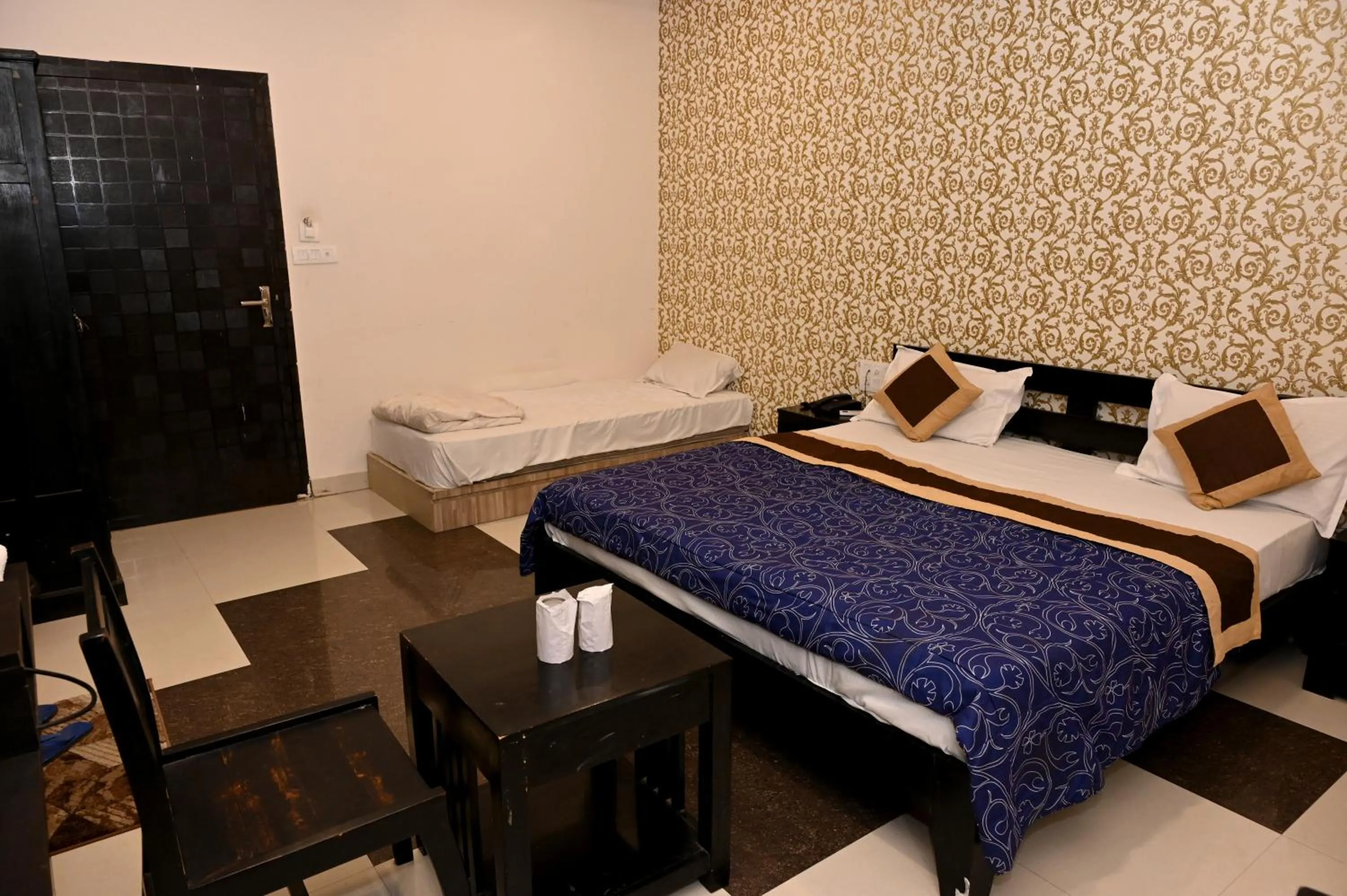Bed in Om Heritage Haveli