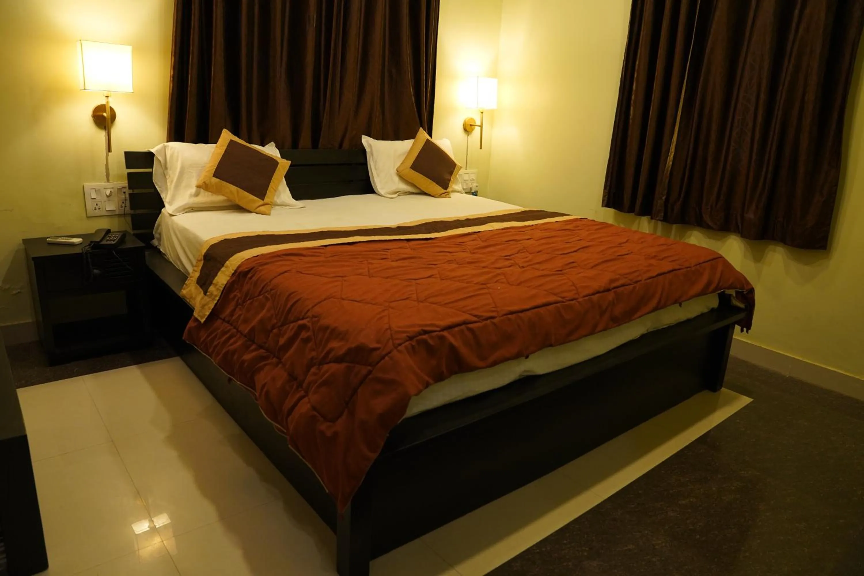 Bed in Om Heritage Haveli