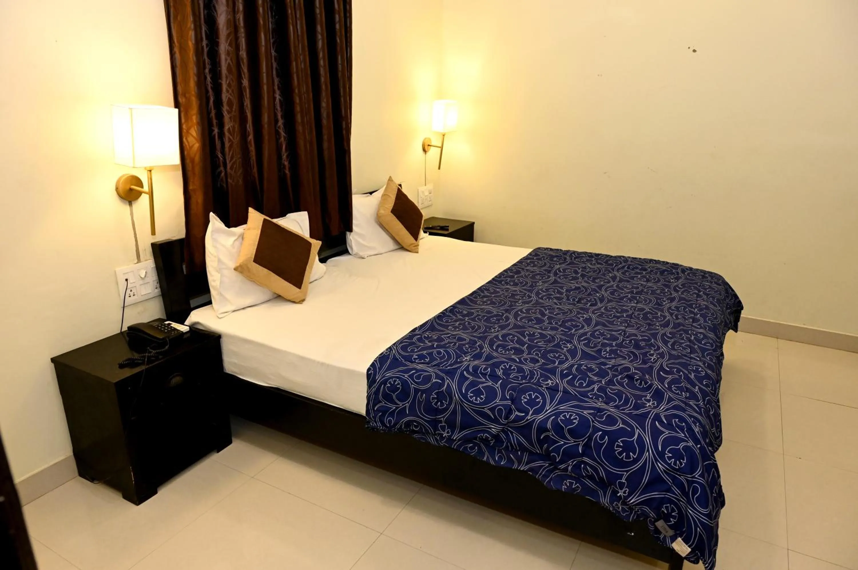 Bed in Om Heritage Haveli