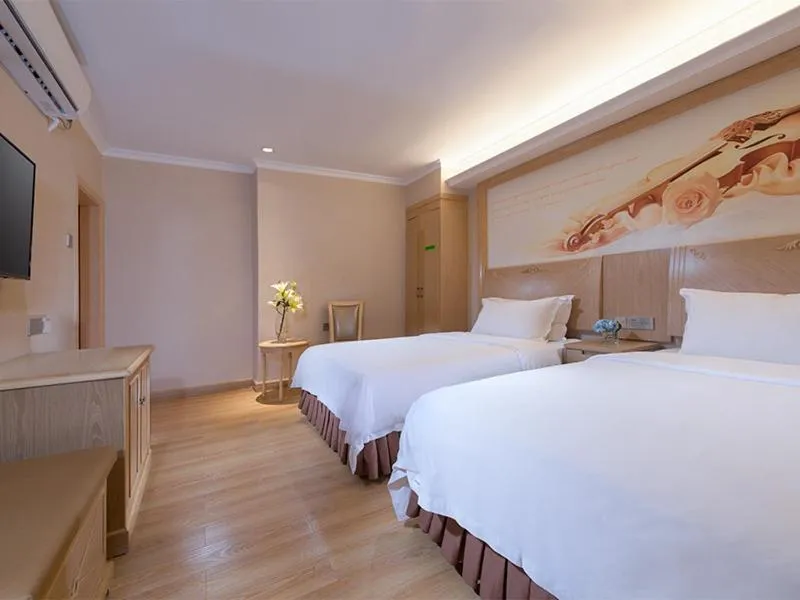 Bed in Vienna Hotel Shenzhen Haiwan