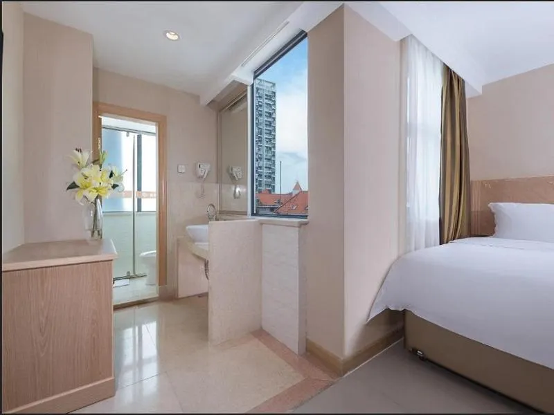 Bed in Vienna Hotel Shenzhen Haiwan
